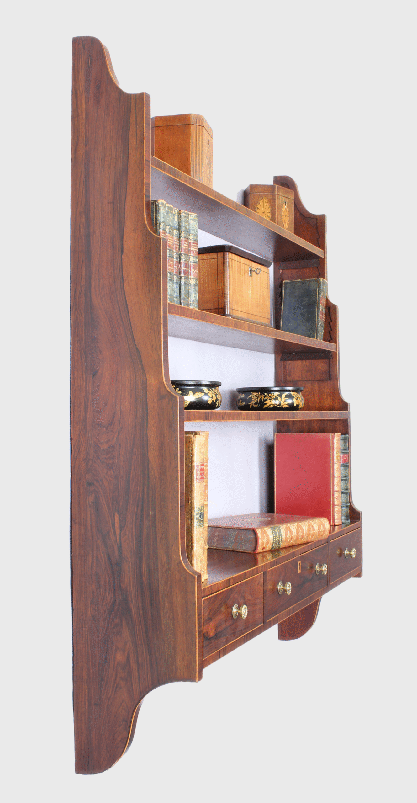 Unusual George III period mahogany hanging shelves