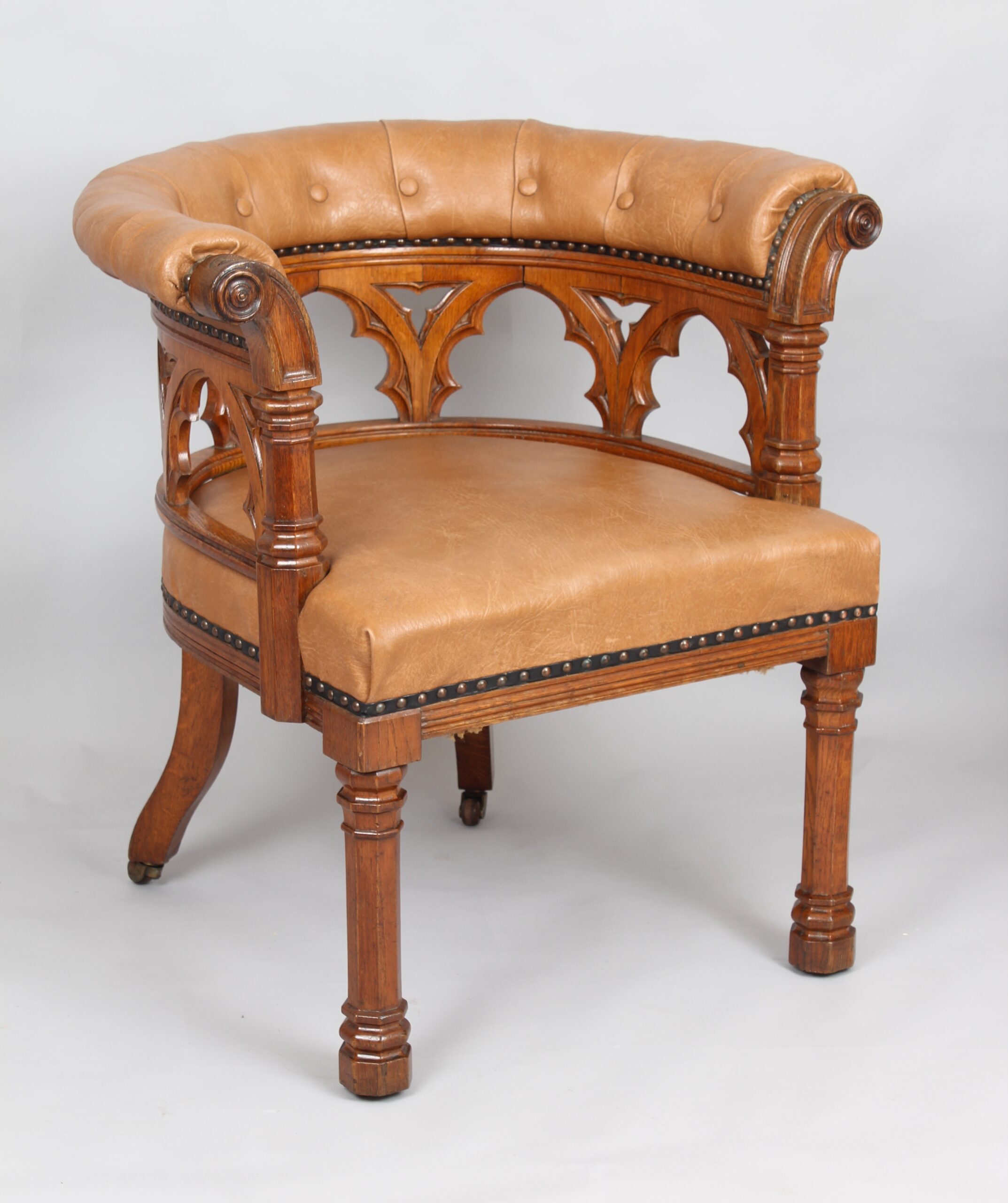 Impressive Victorian golden oak tub armchair in the Gothic Revival manner