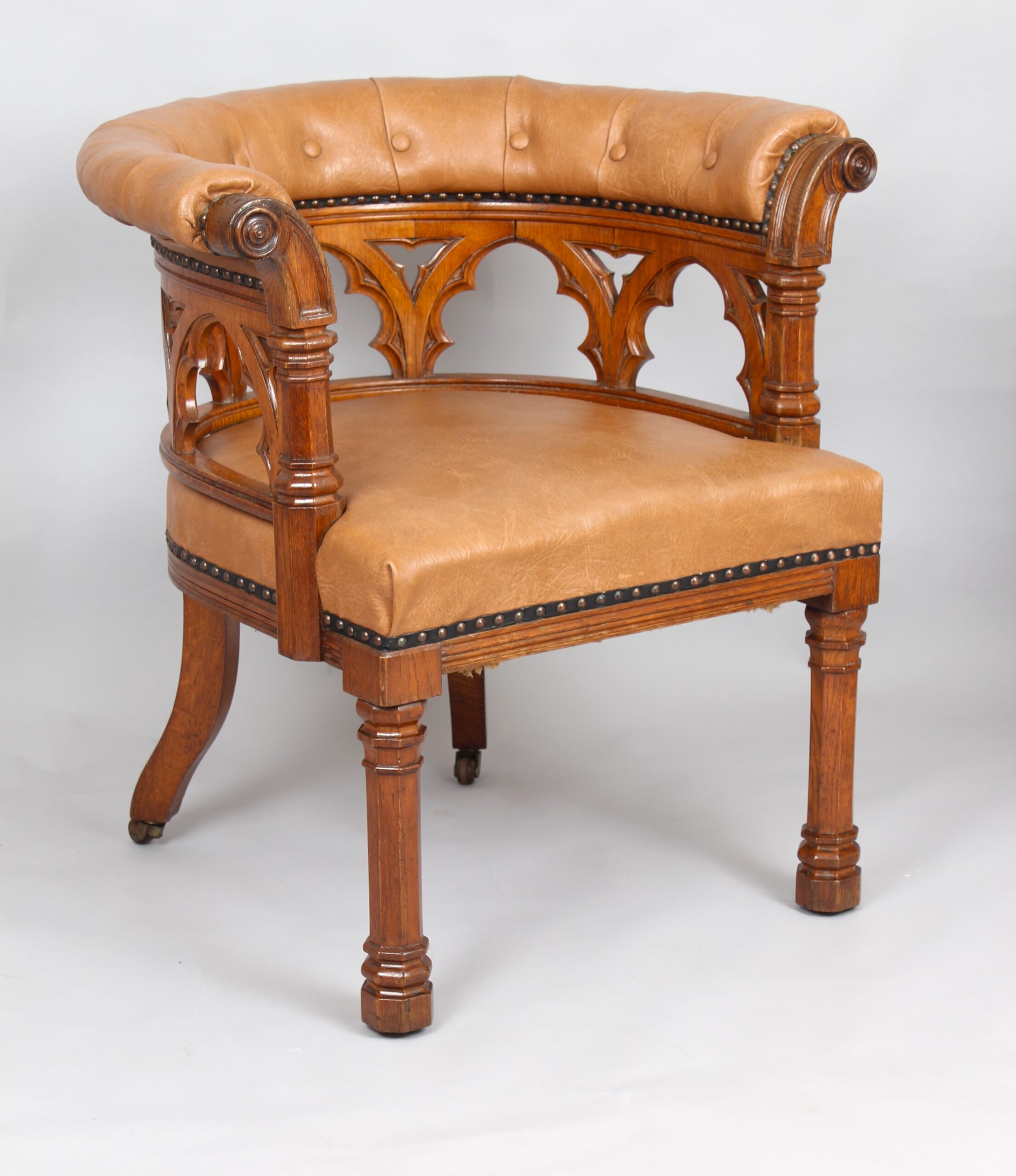 Impressive Victorian golden oak tub armchair in the Gothic Revival manner