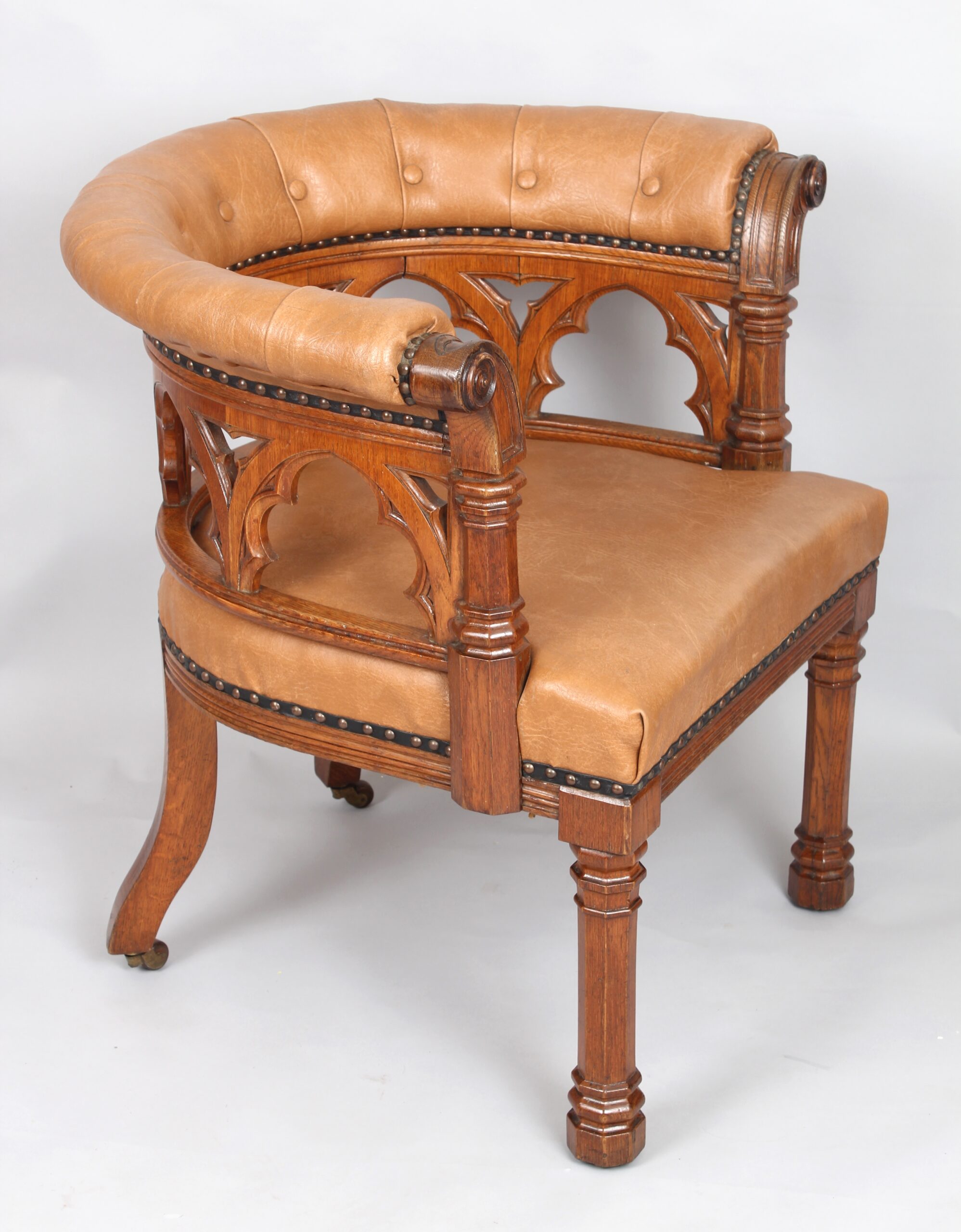 Impressive Victorian golden oak tub armchair in the Gothic Revival manner