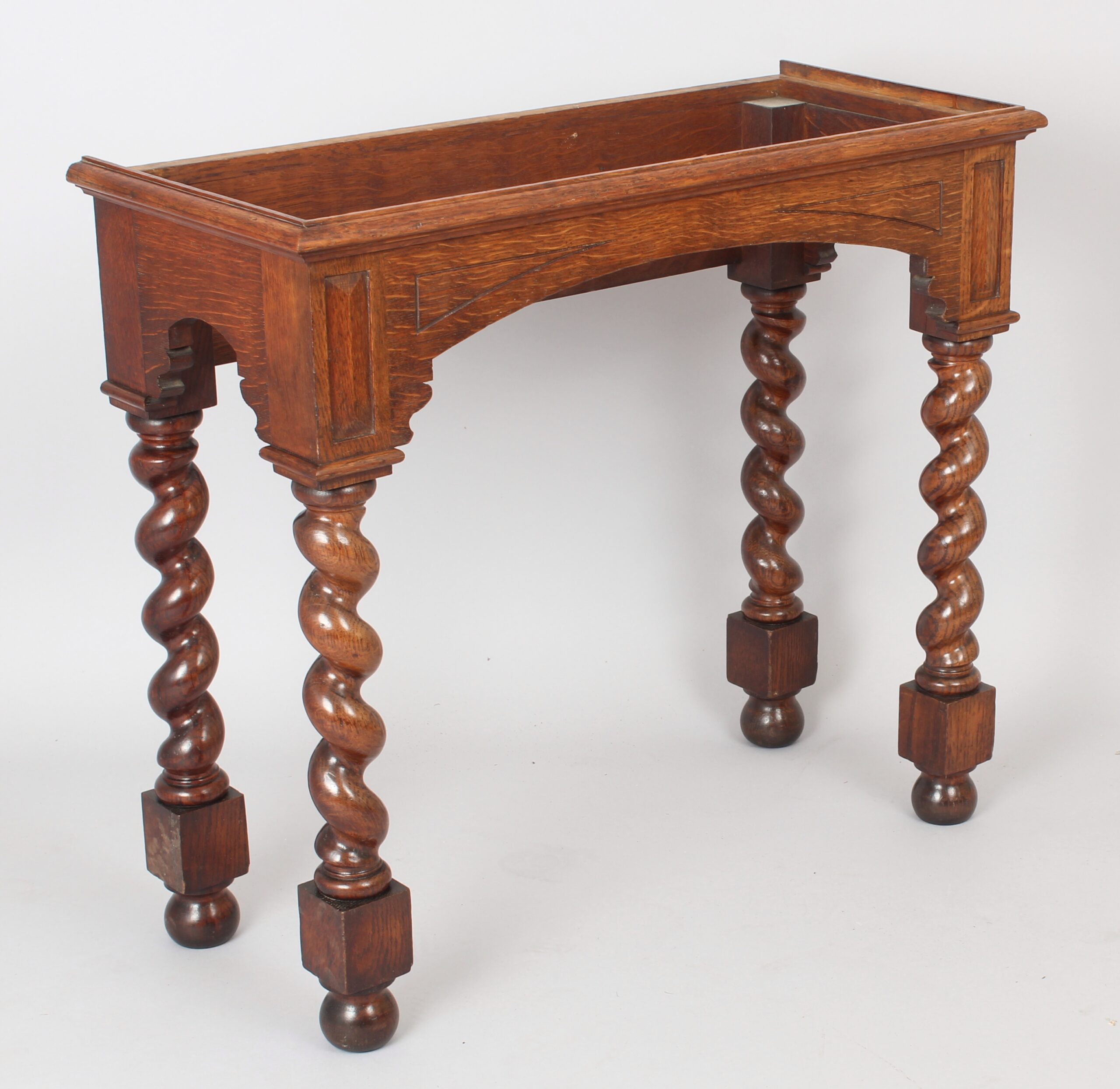 An Edwardian oak stationery cabinet