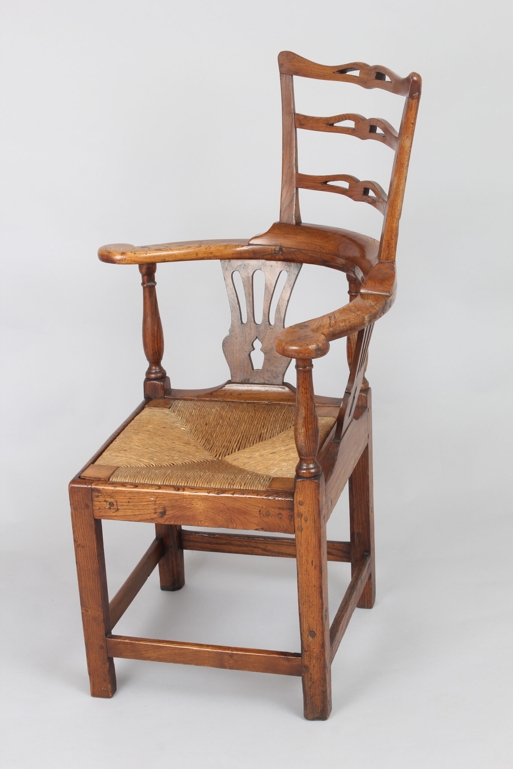 A George III period elm corner-chair