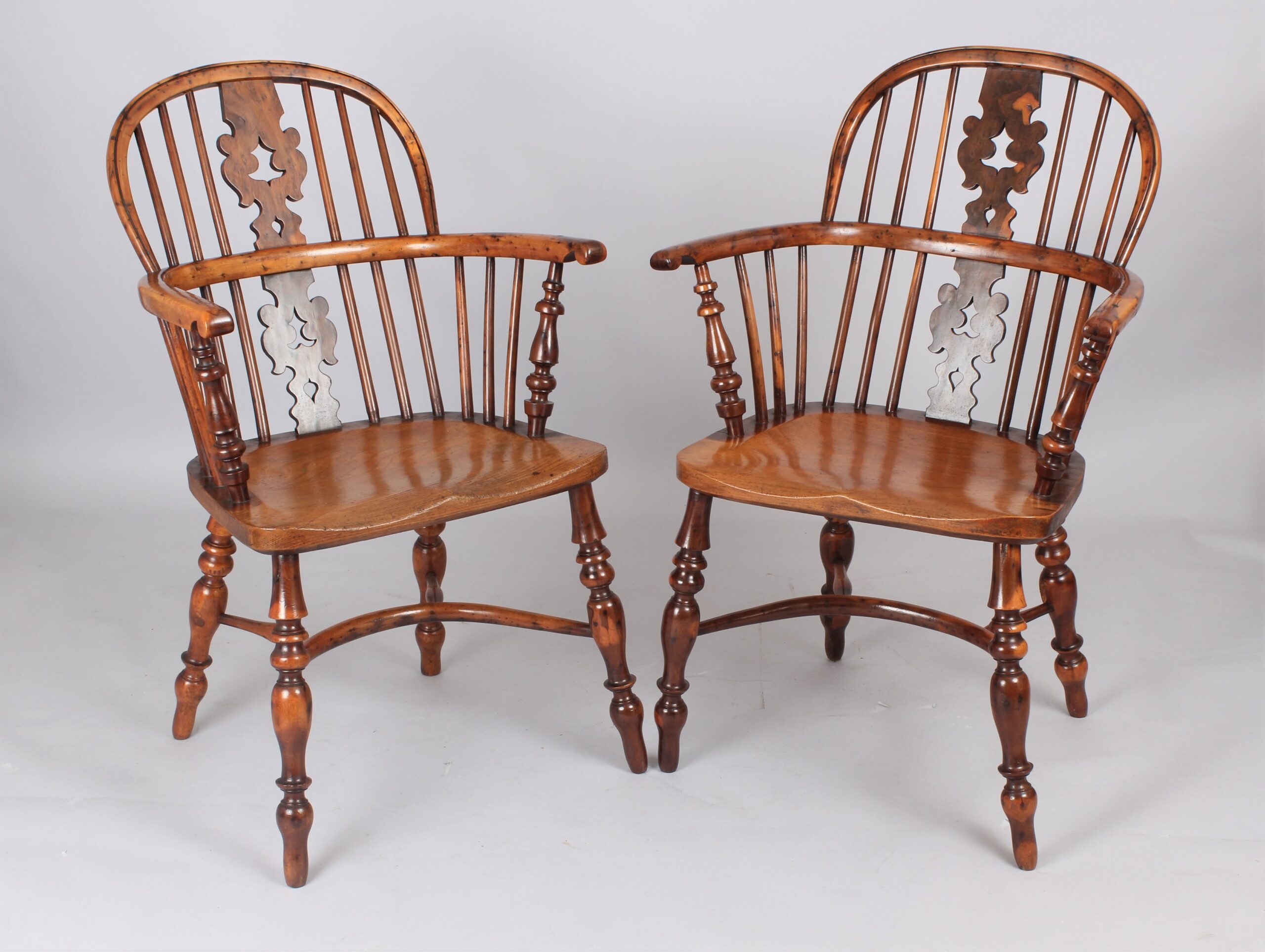 Fine pair of early 19th century yew Windsor arm chairs