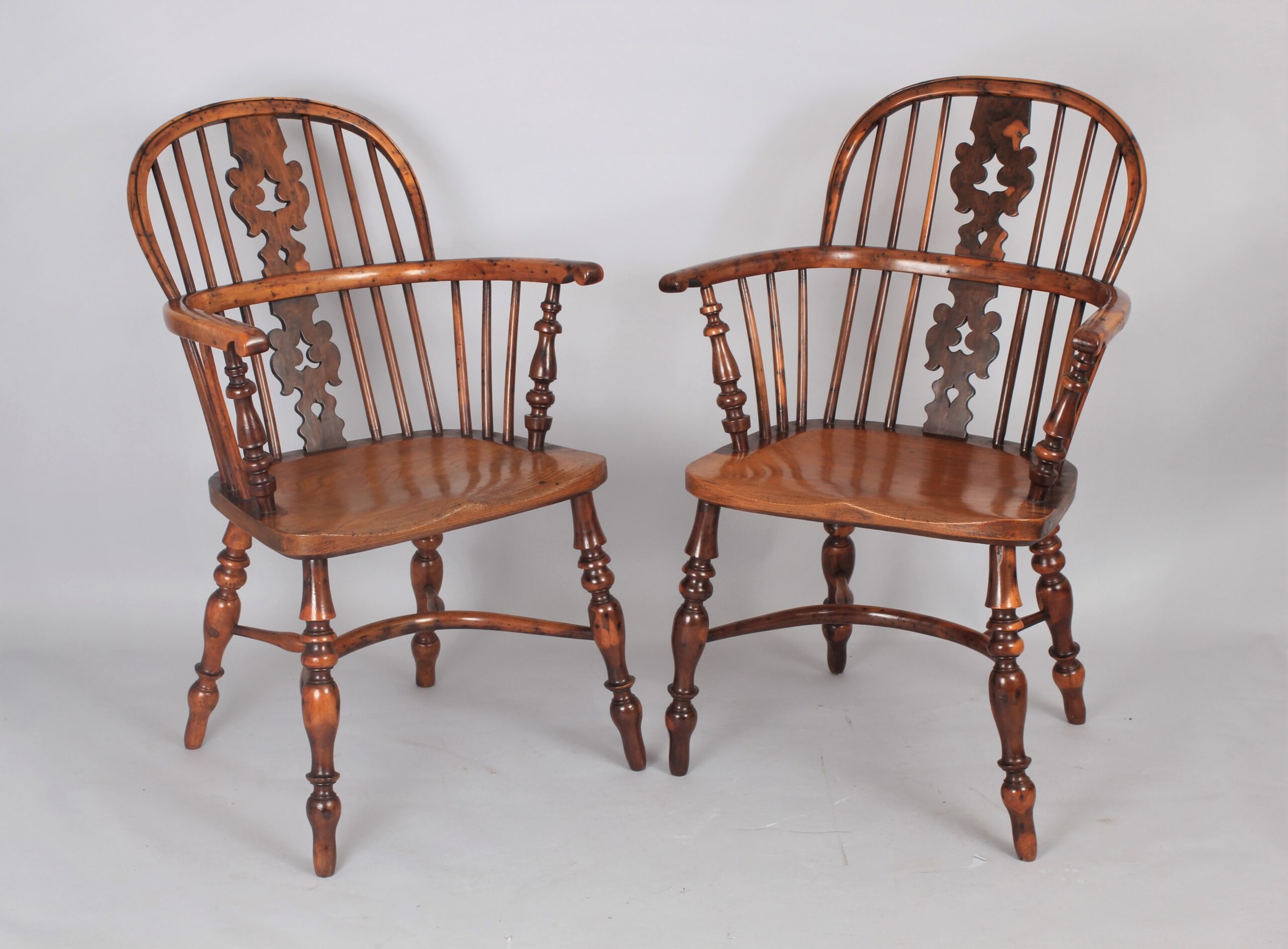Fine pair of early 19th century yew Windsor arm chairs