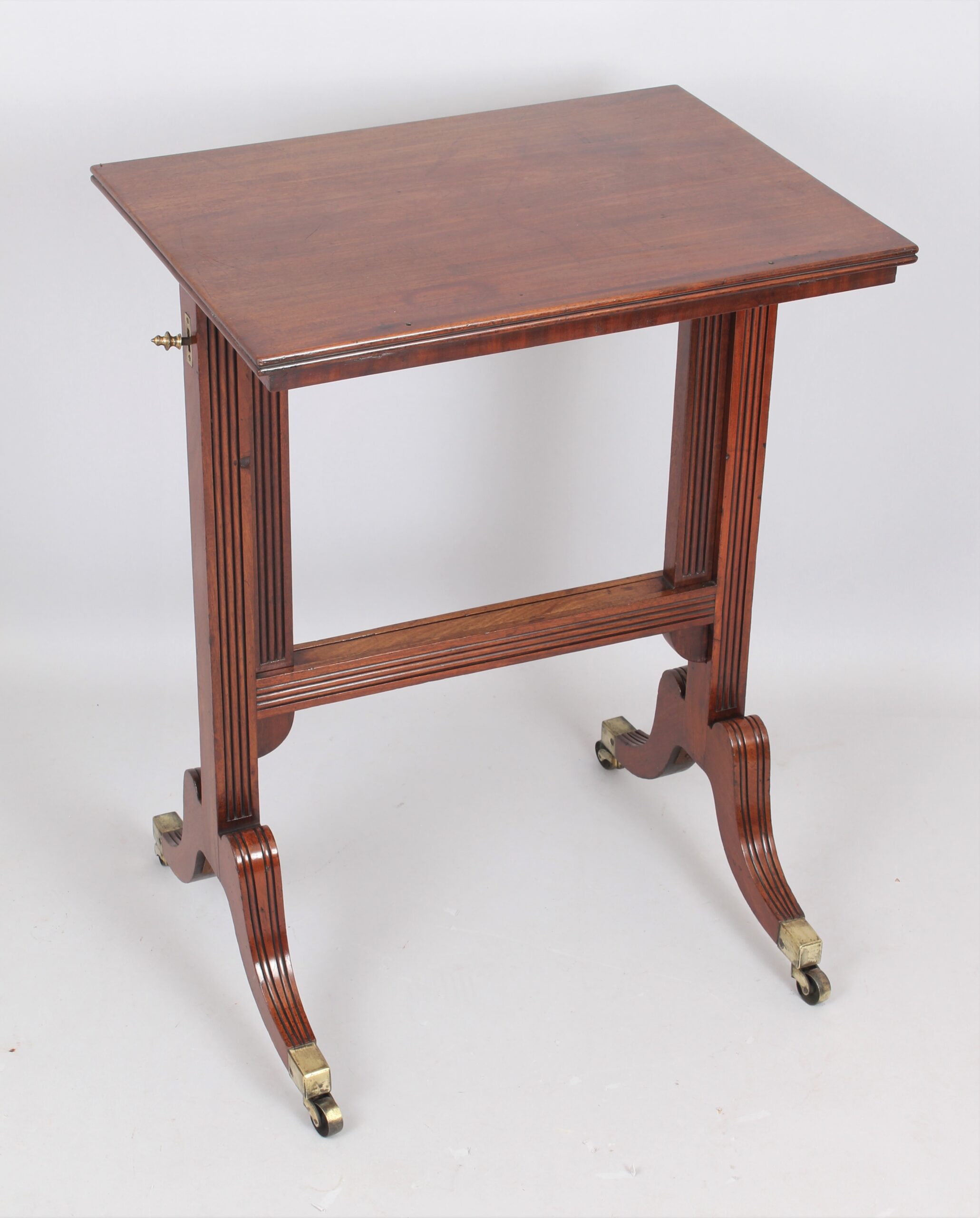 A Regency mahogany adjustable reading table
