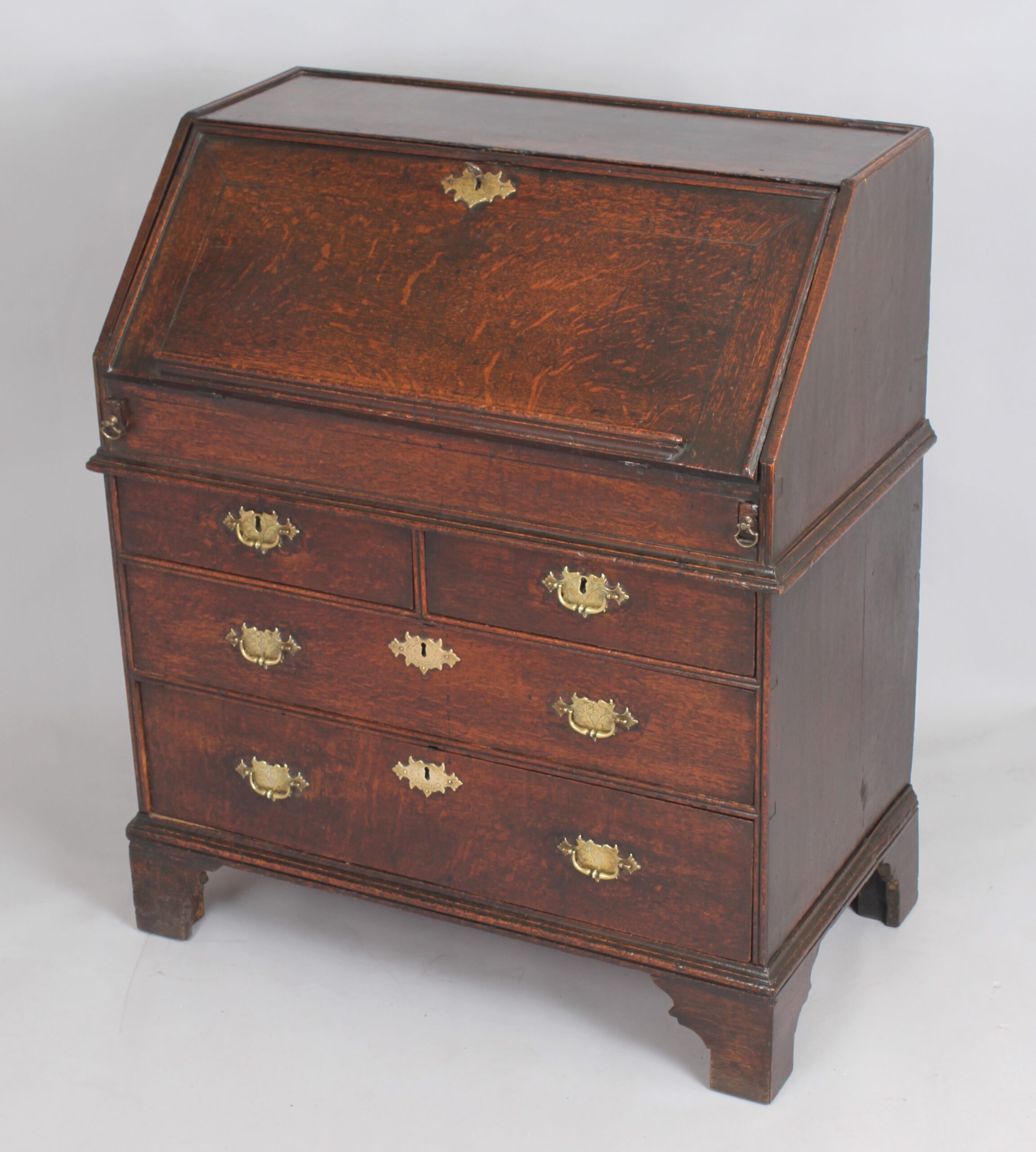 An Early 18th century oak bureau