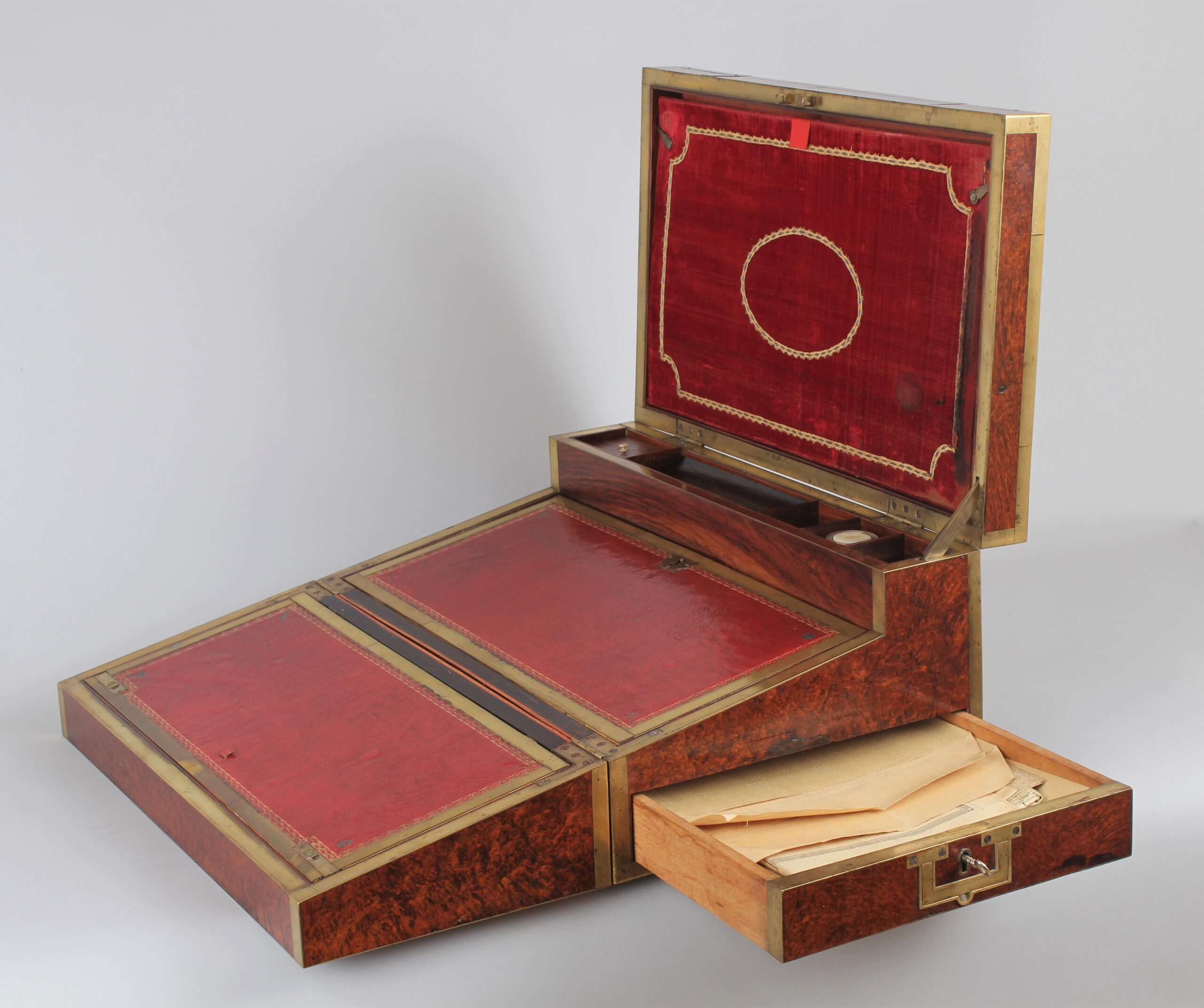 An important mid 19th century French brass mounted amboyna writing box