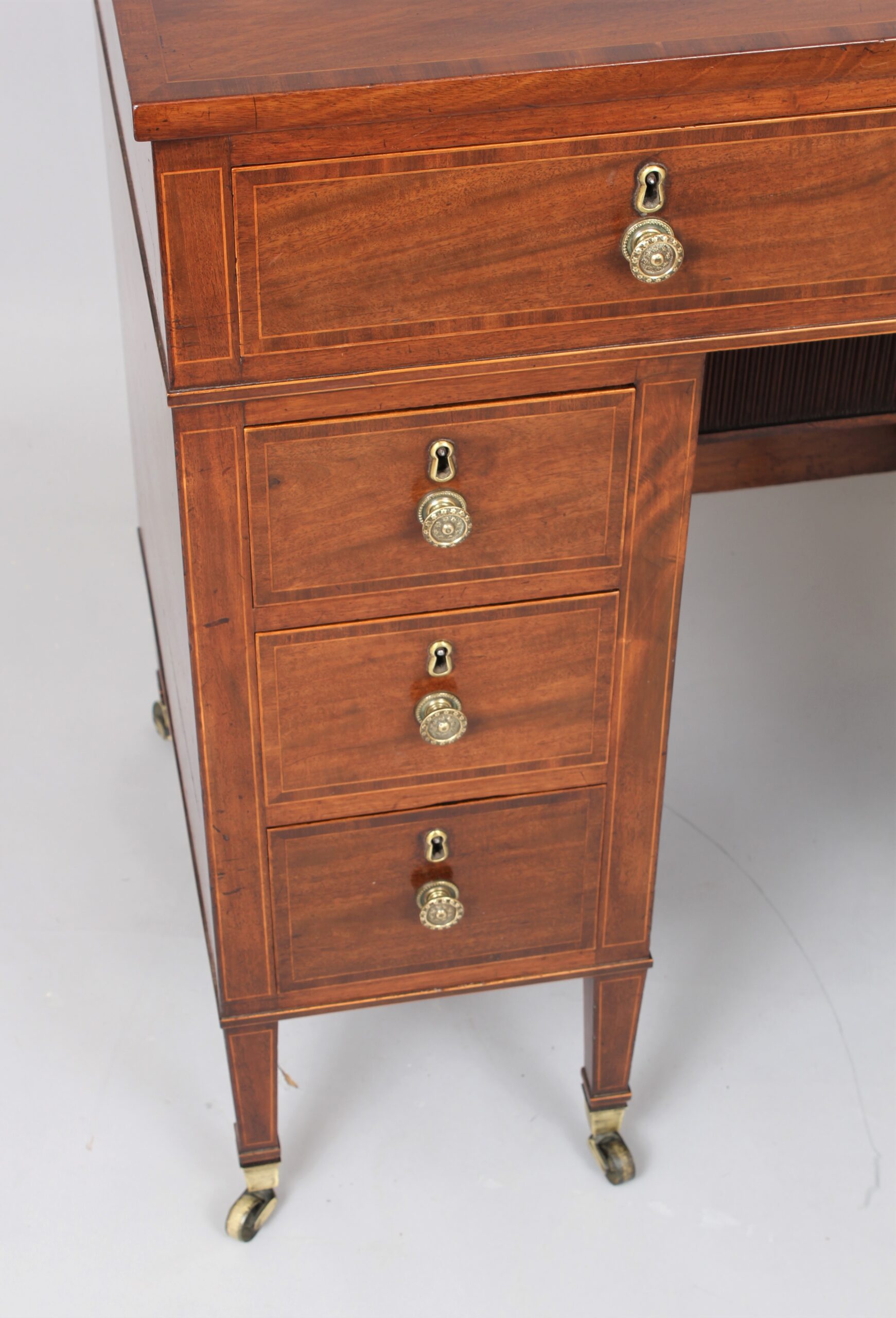 Late 18th century Sheraton period mahogany kneehole dressing table