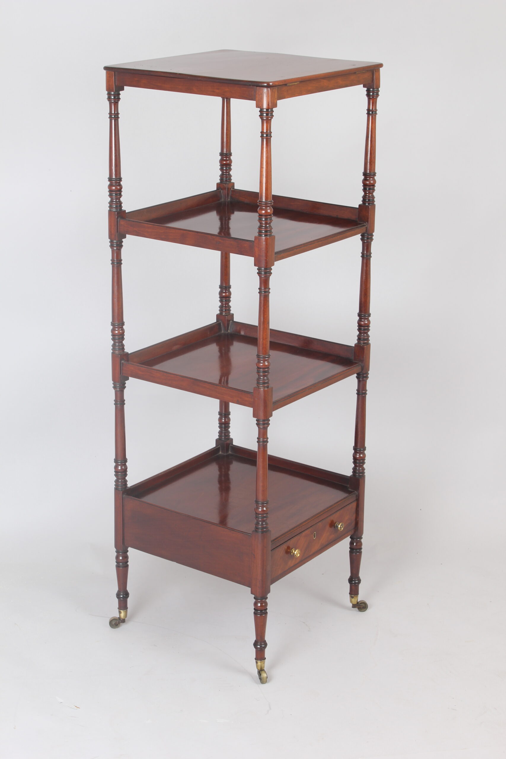Early 19th century Regency period mahogany four tray whatnot