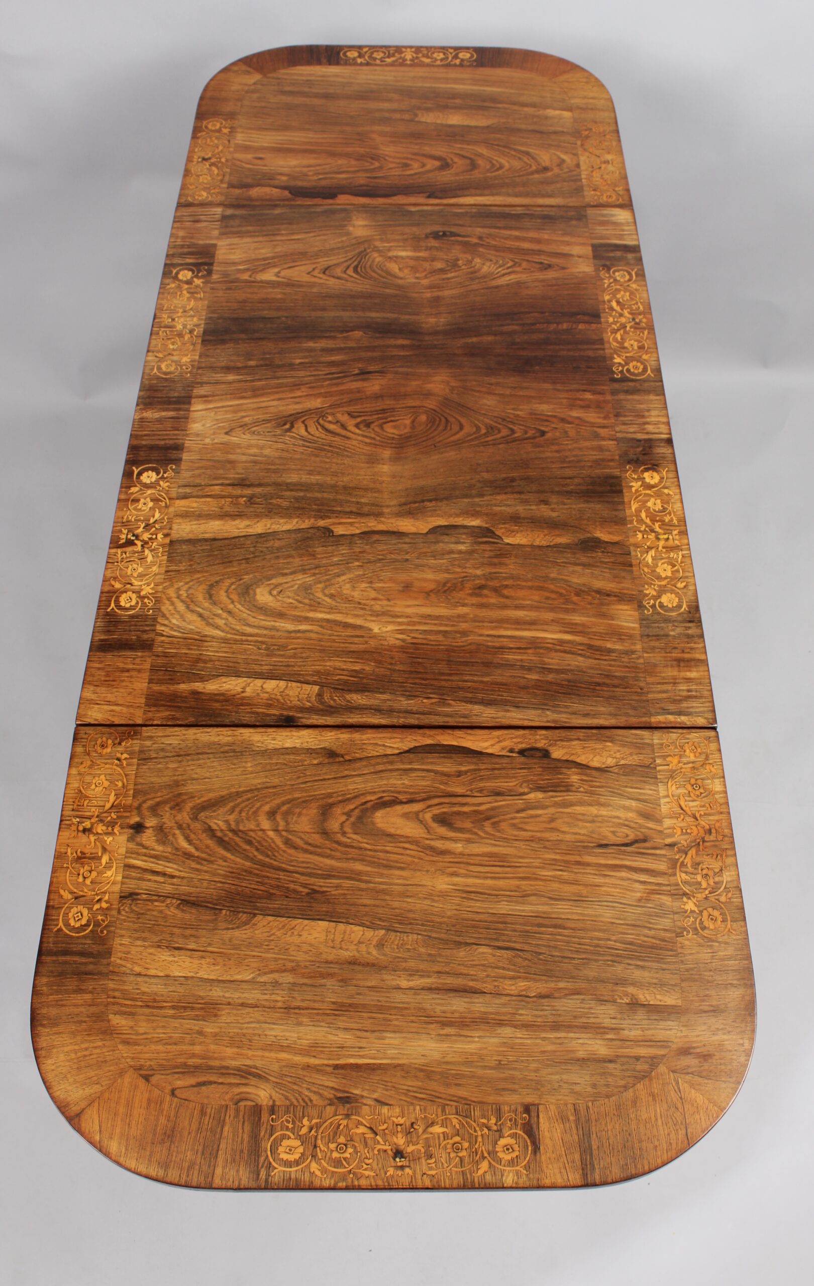 A fine Regency period sofa table of unusually small proportions