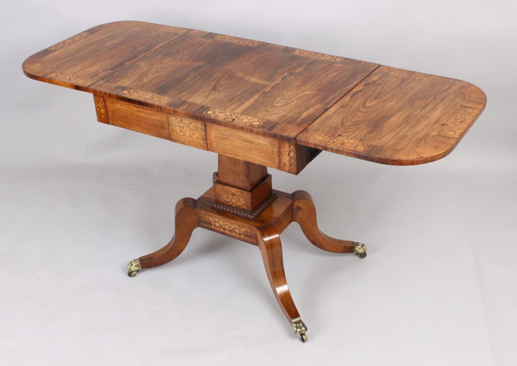 A fine Regency period sofa table of unusually small proportions