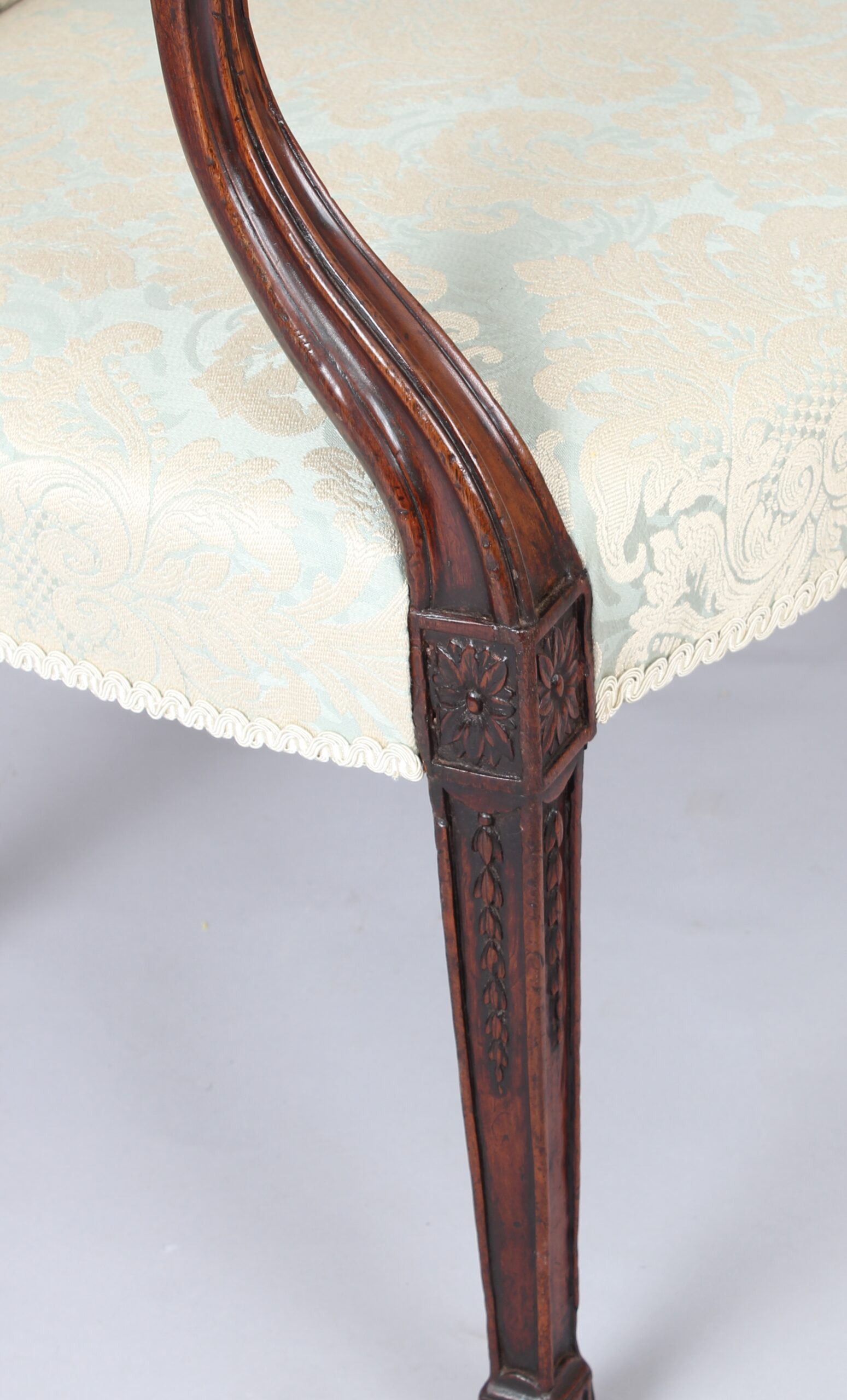 George III mahogany lady’s open armchair