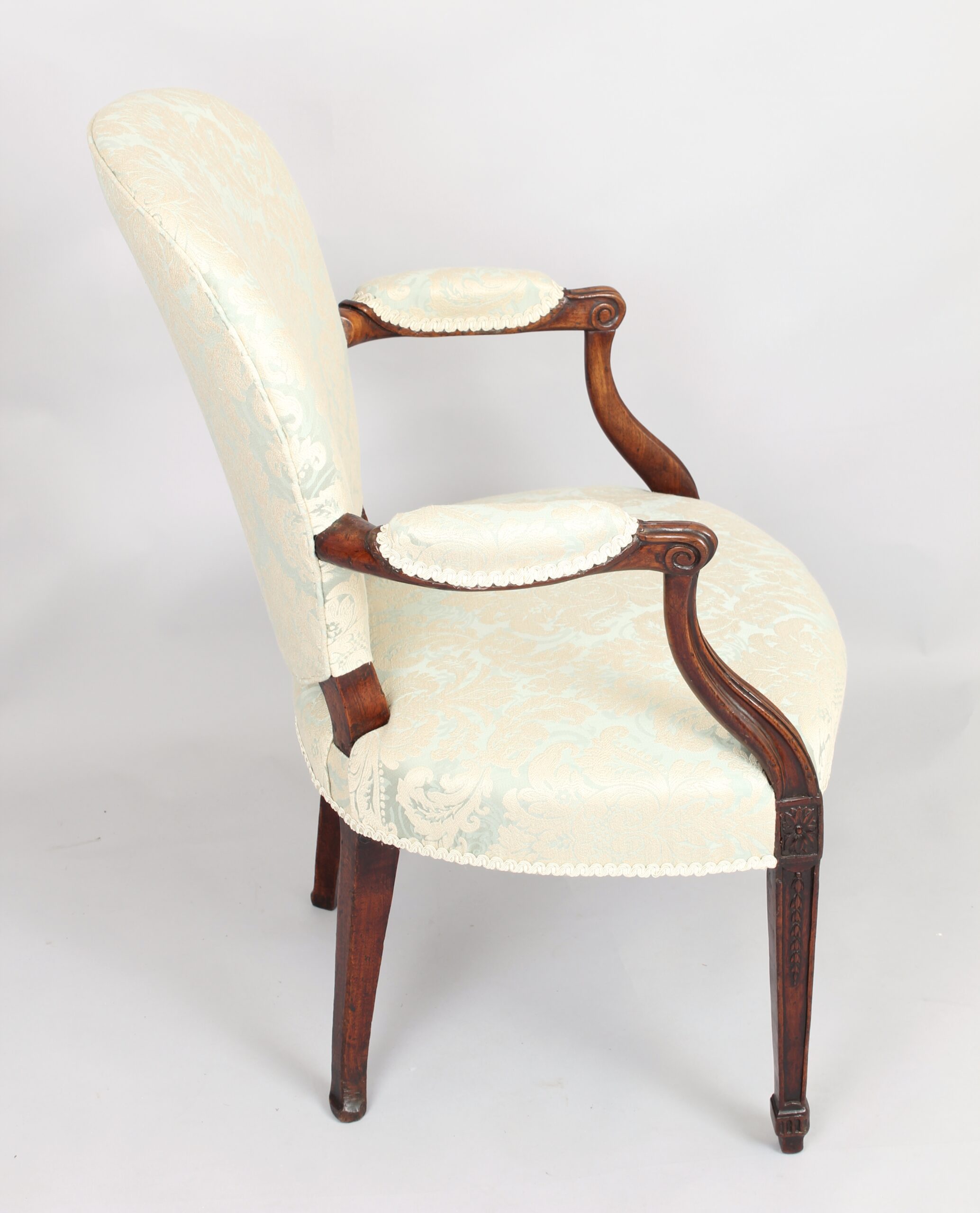 George III mahogany lady’s open armchair