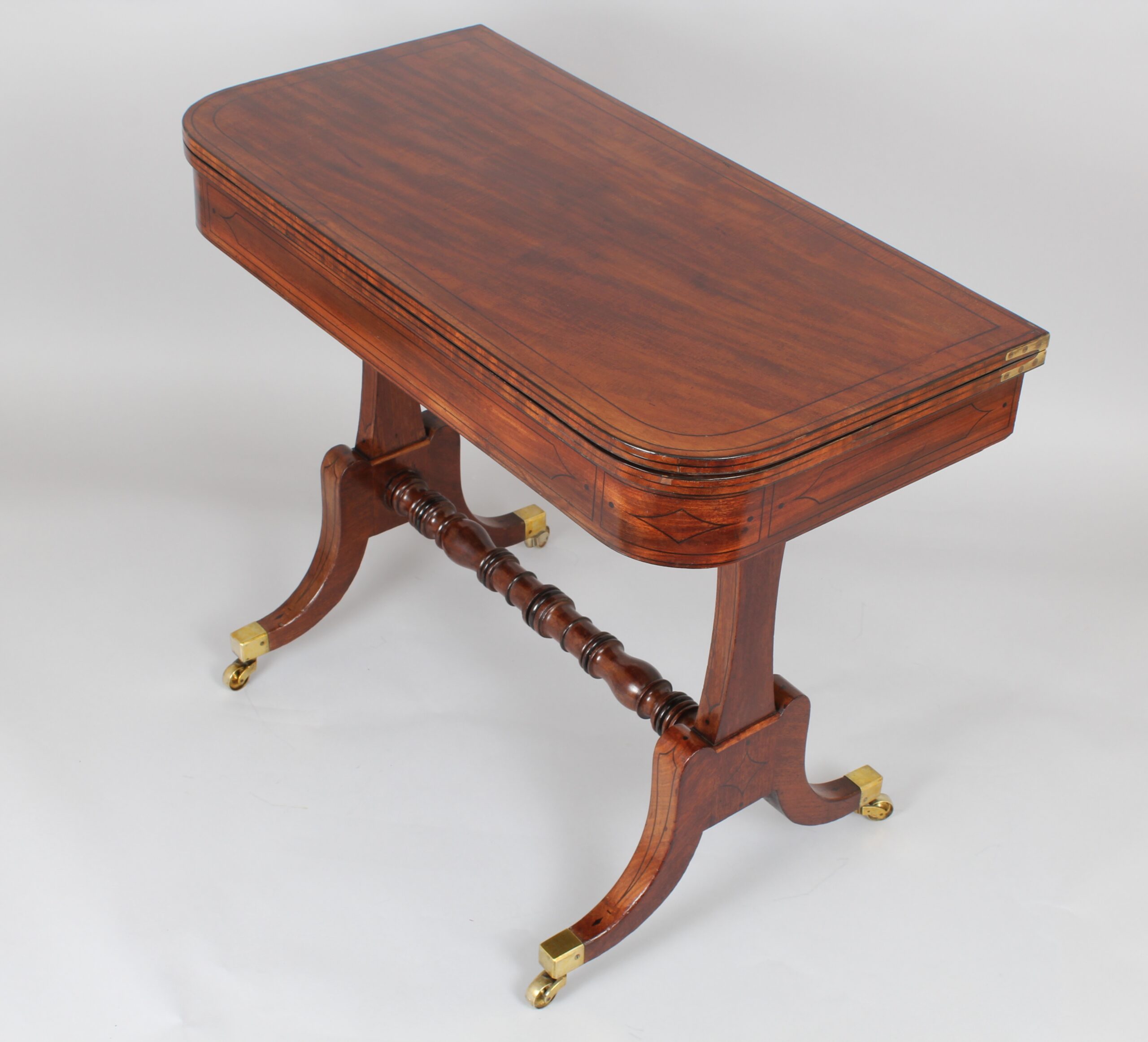 A Regency period mahogany card table