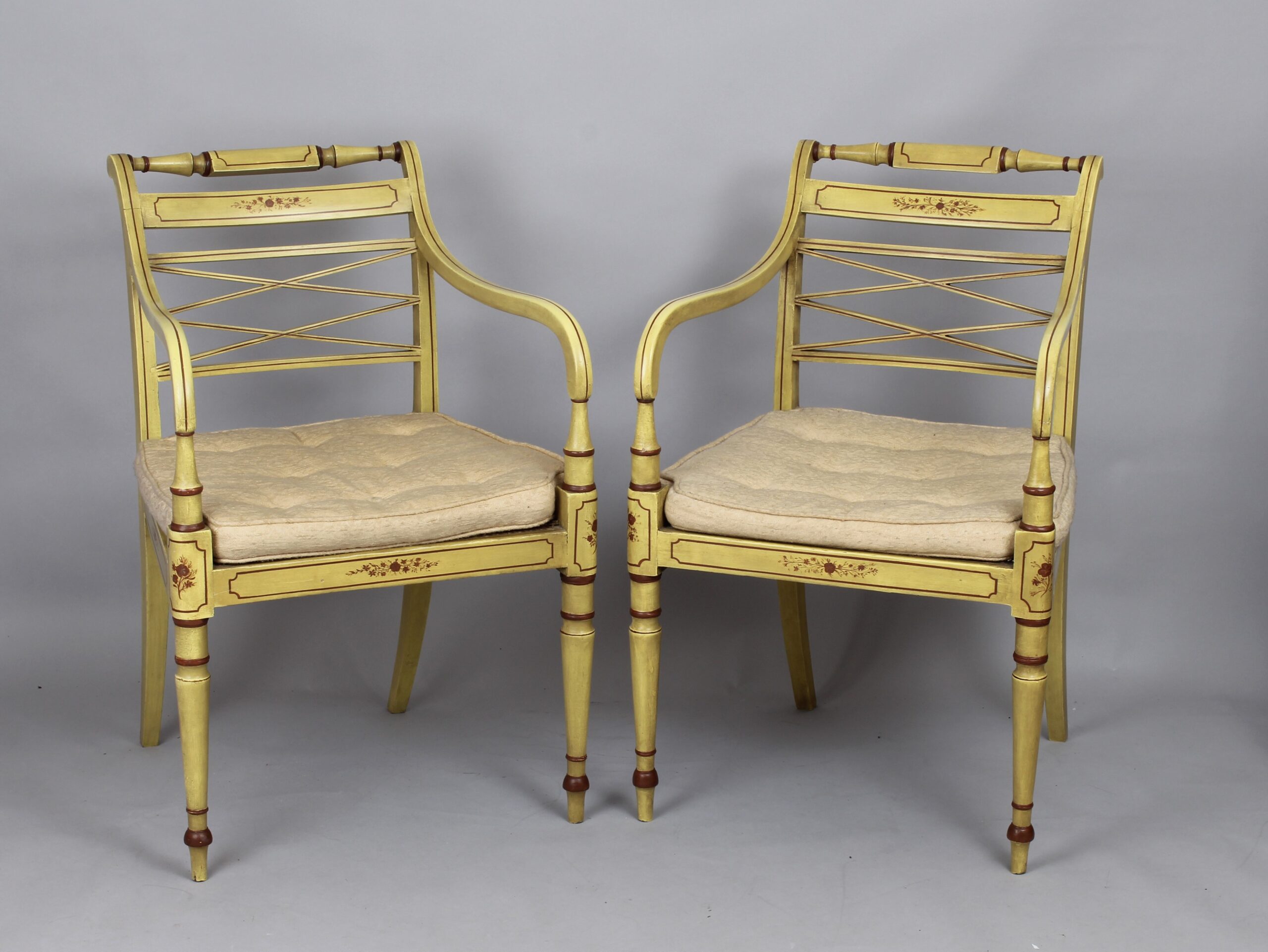 A pair of Regency painted elbow-chairs