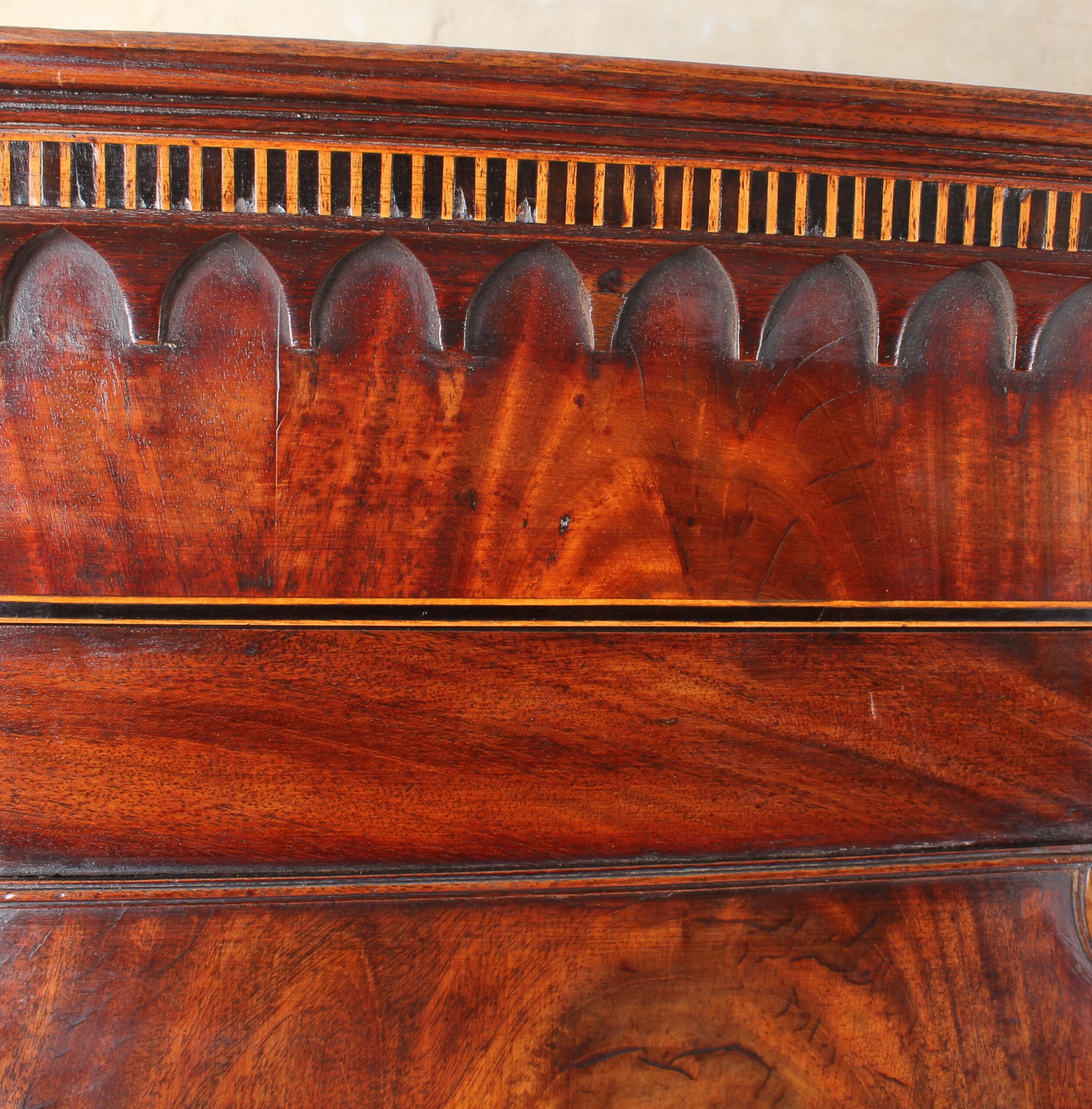 A fine and small George III mahogany linen press