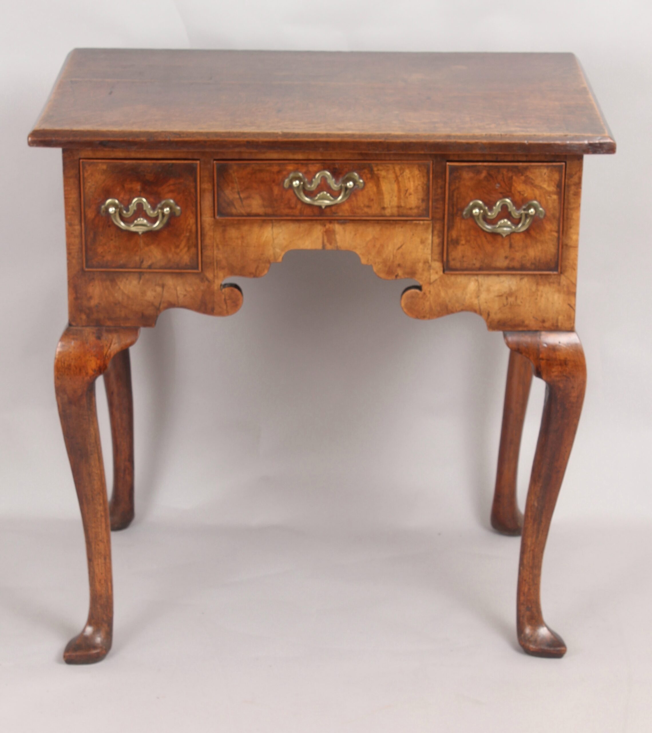 George II period walnut and oak lowboy