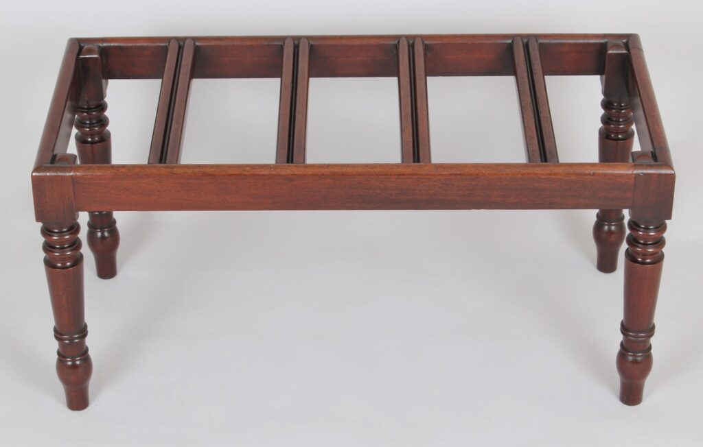 A very fine mahogany luggage stand