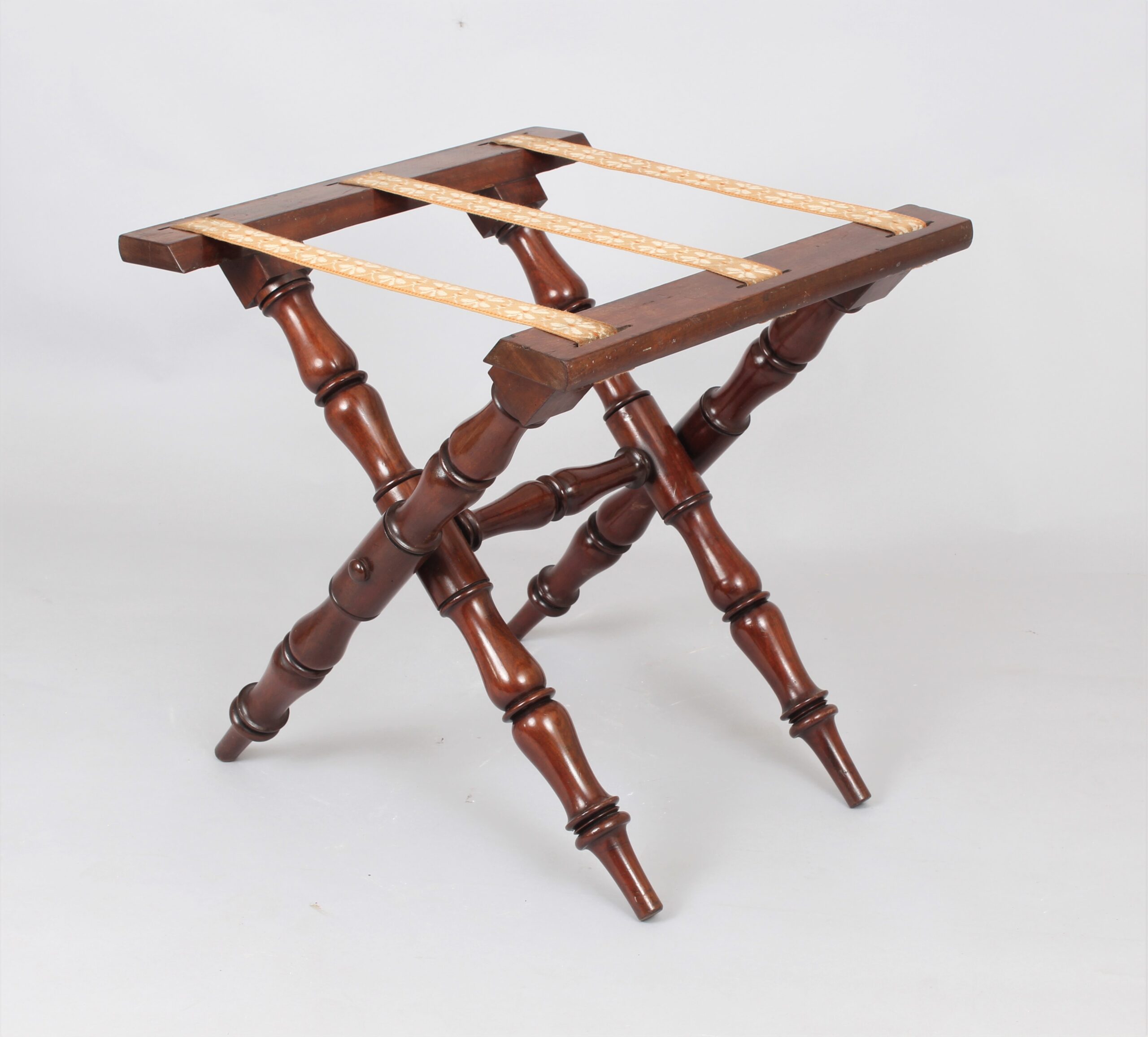 Folding mahogany luggage stand
