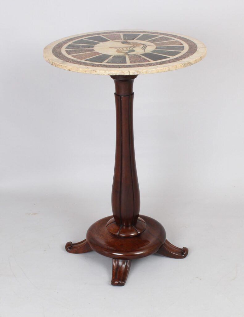 An early 19th century marble-topped pedestal table