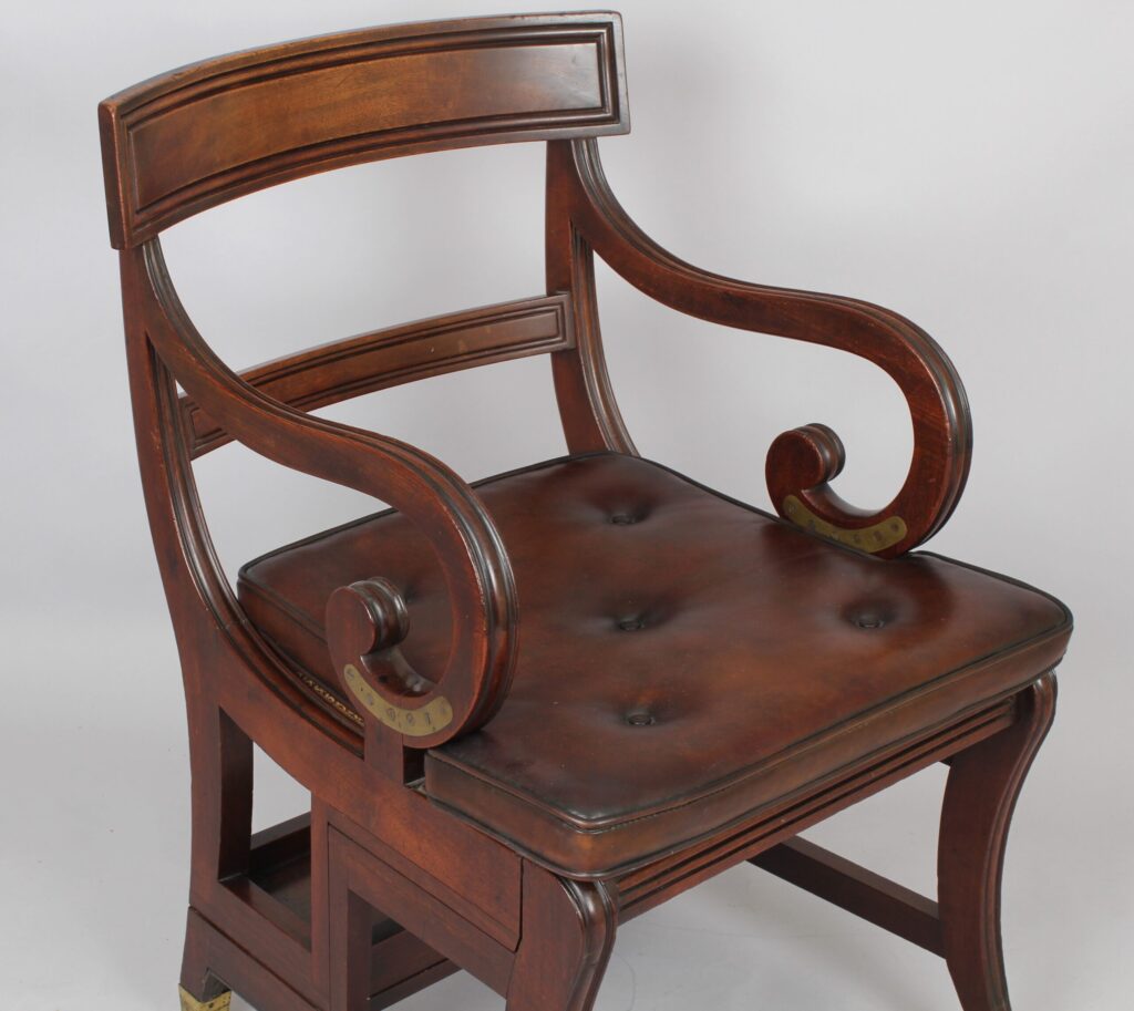A late Regency period mahogany metamorphic library chair / library steps in the manner of Morgan and Sanders