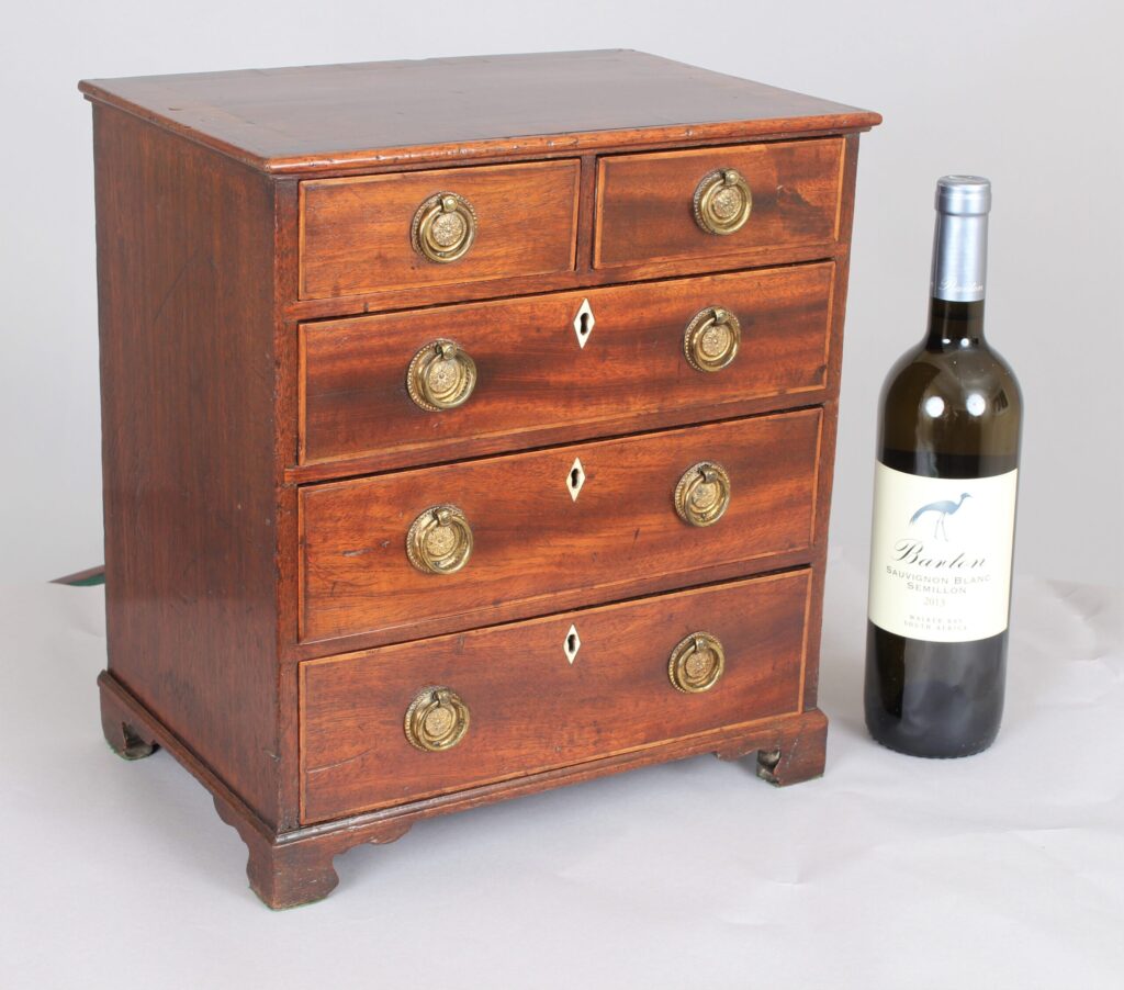 Delightful late 18th century miniature chest of drawers