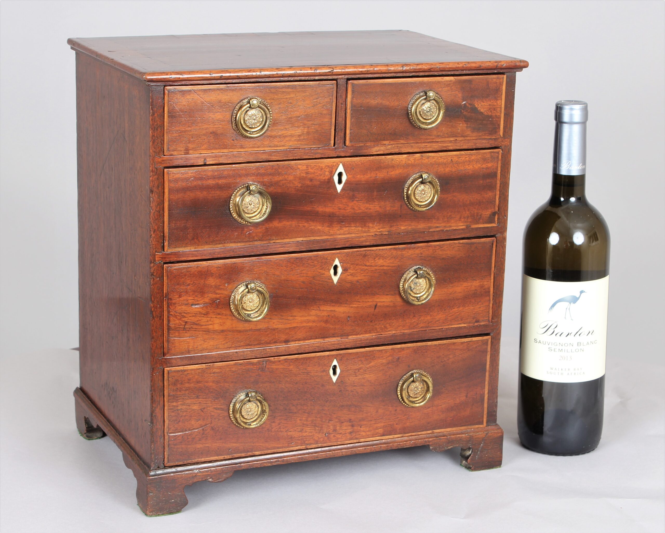 Delightful late 18th century miniature chest of drawers