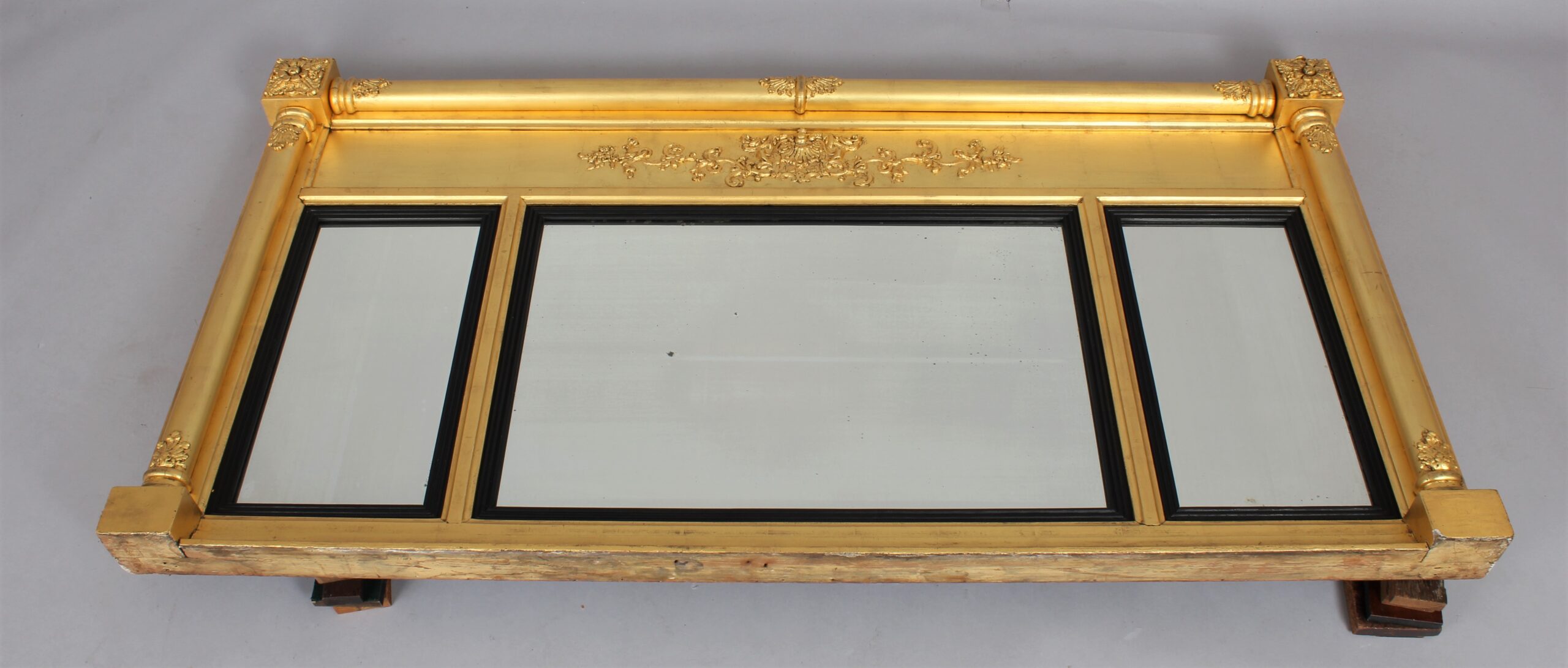 A Regency triple plate gilt overmantle mirror