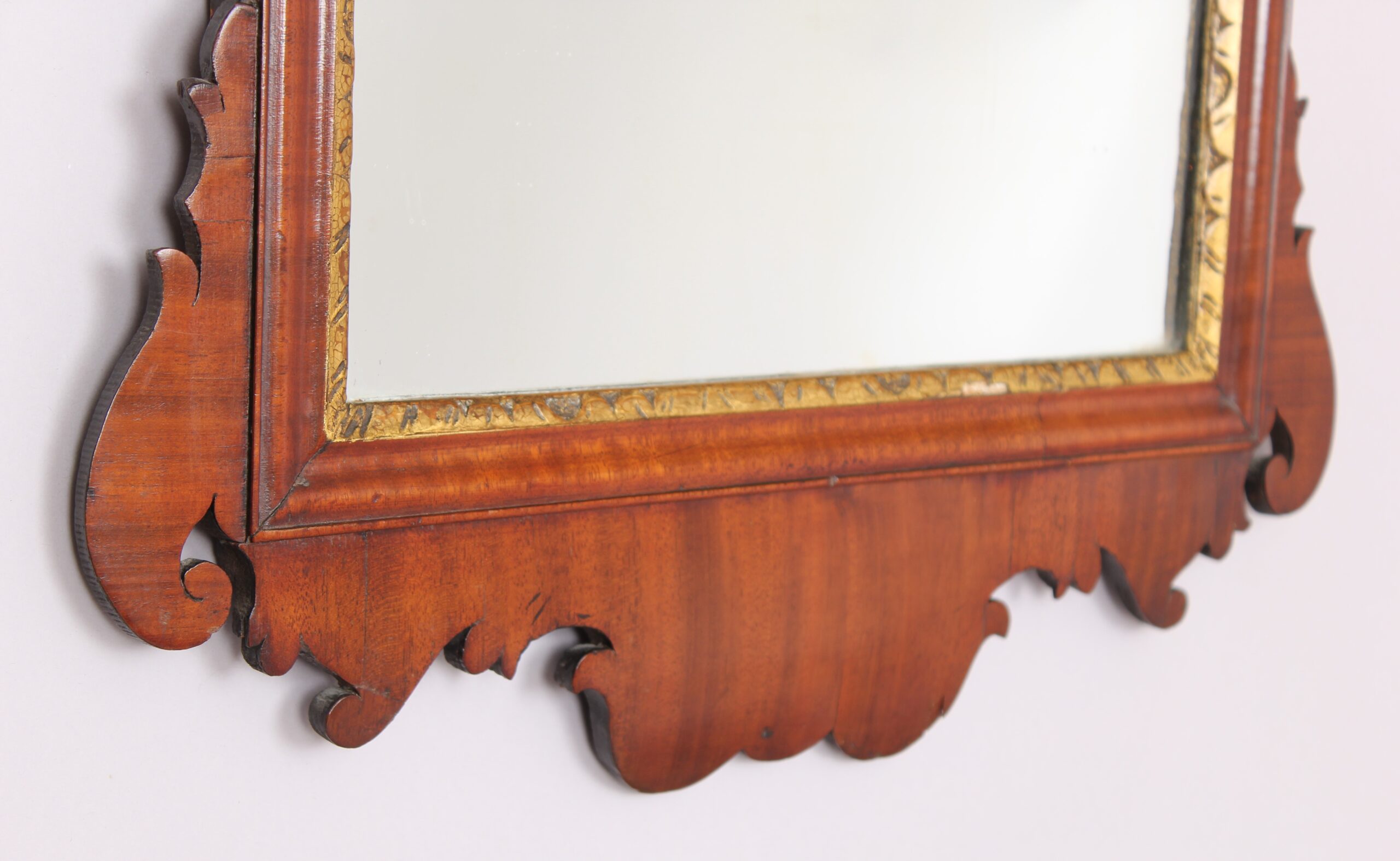 A mahogany `bird` mirror in the rococo taste