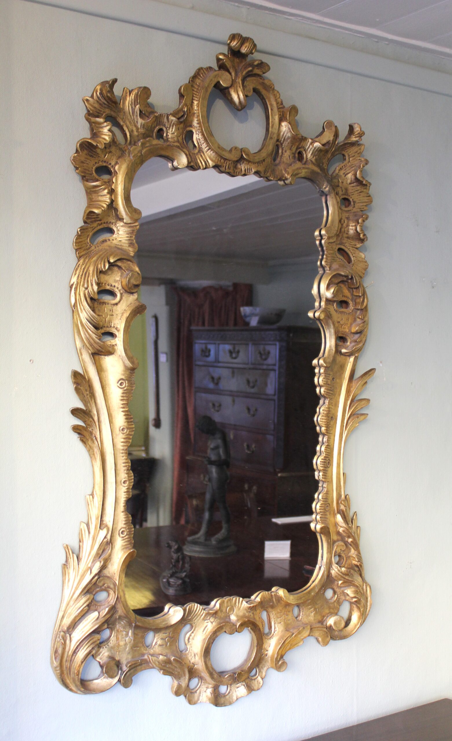 A carved and gilt wood mirror in the manner of Matthias Lock (c1710 – 1765)