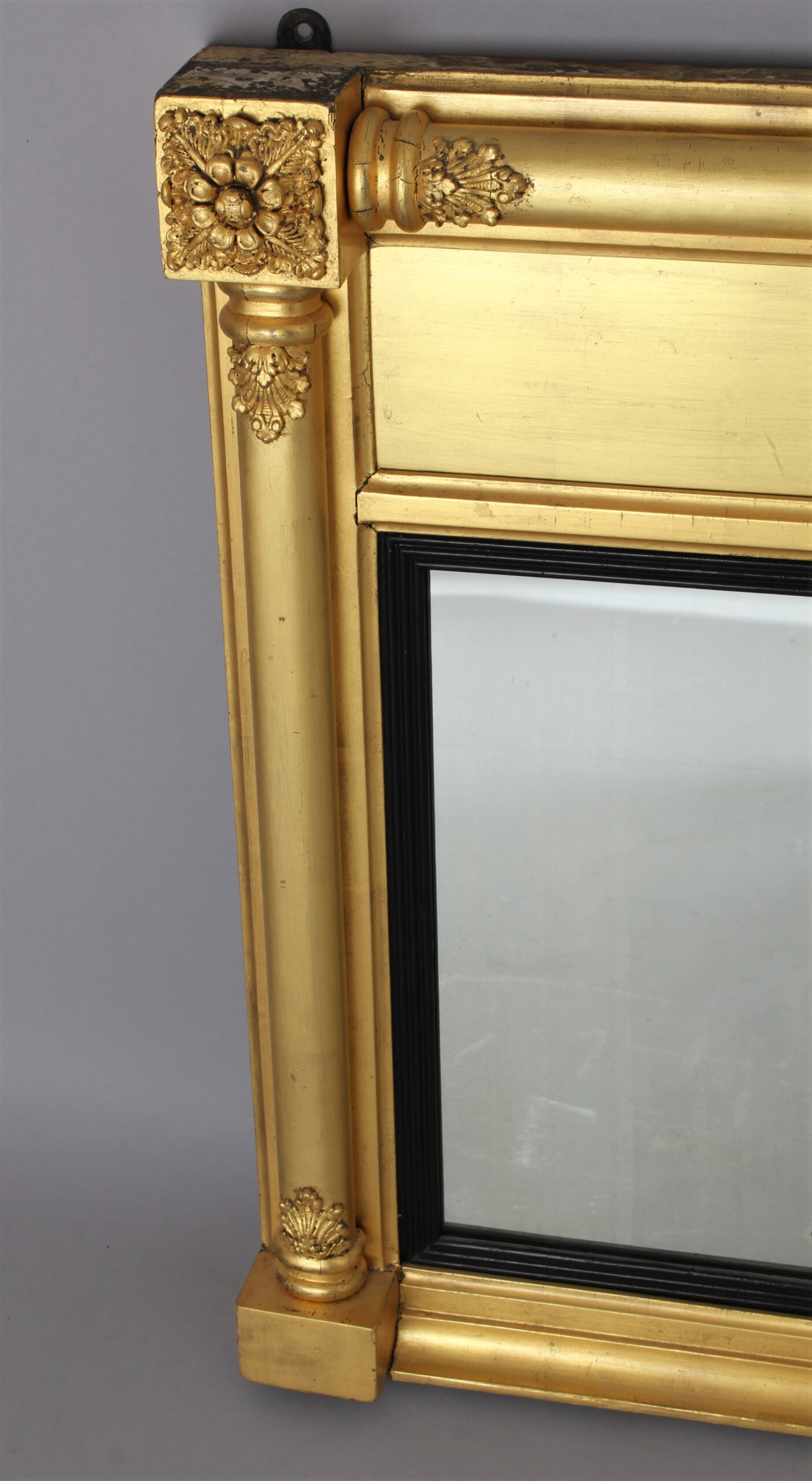 A Regency triple plate gilt overmantle mirror