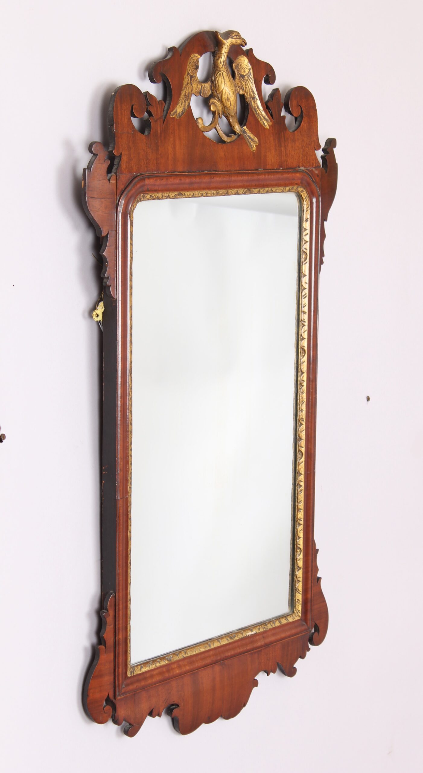 A mahogany `bird` mirror in the rococo taste