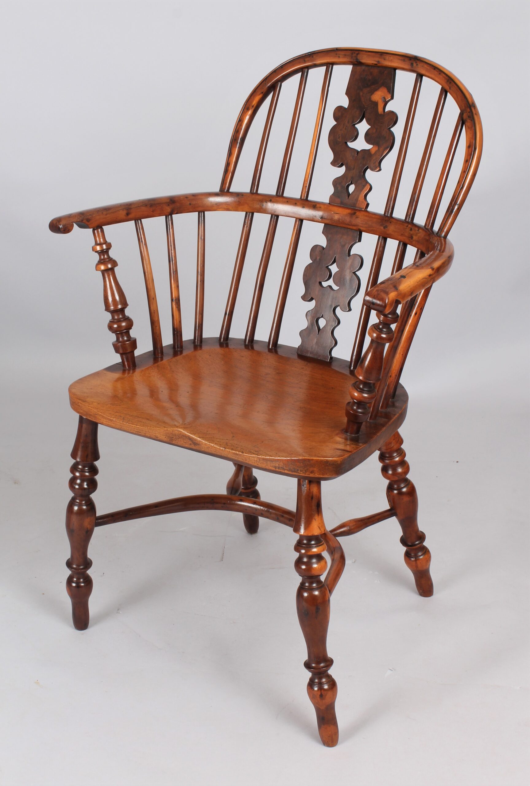 Fine pair of early 19th century yew Windsor arm chairs