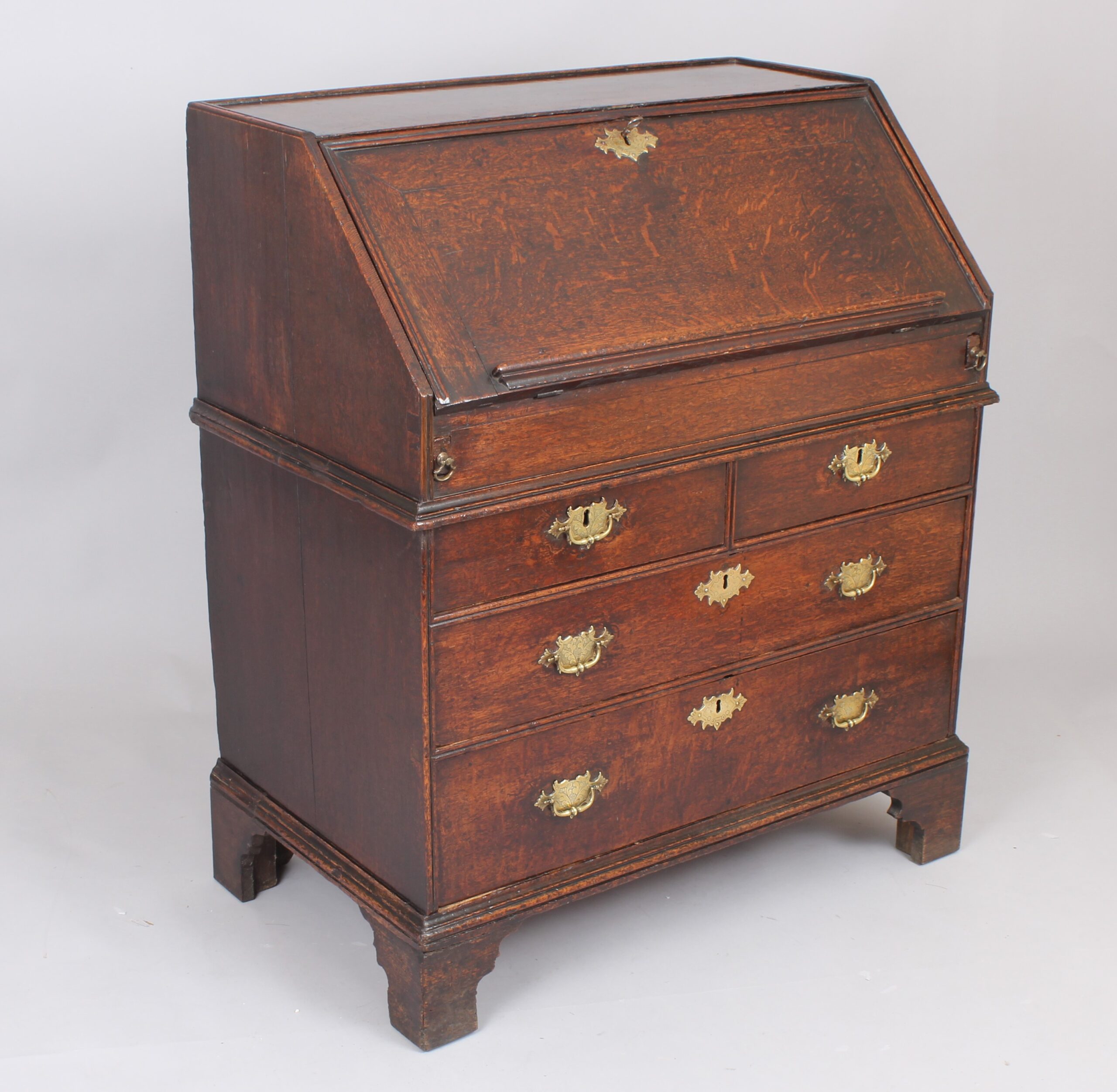 An Early 18th century oak bureau