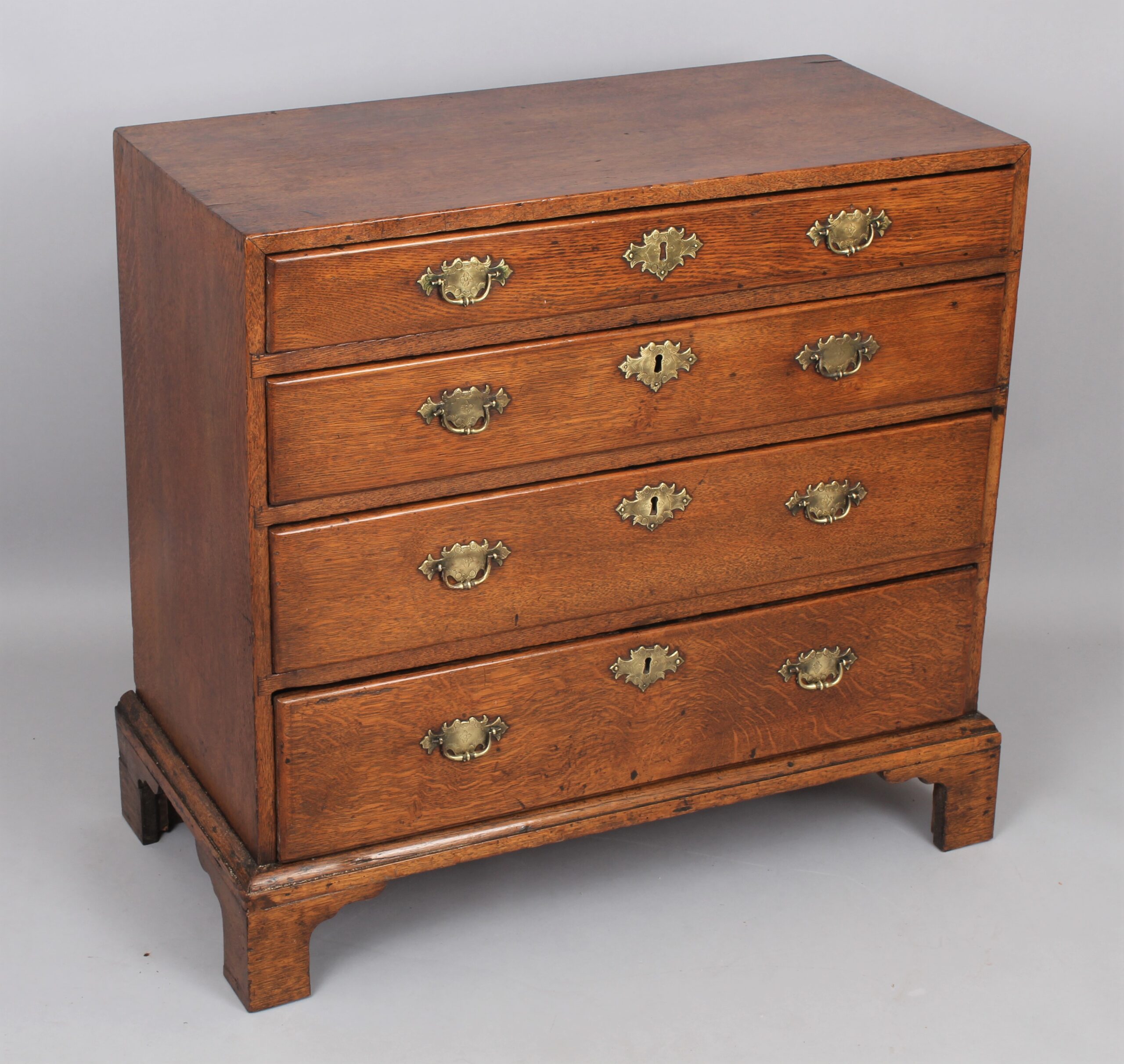 Rare George II period oak chest of drawers of diminutive size