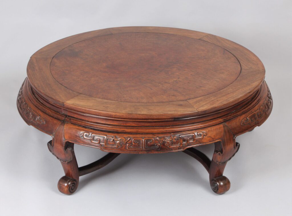A 19th century Chinese hardwood circular ‘Opium’ table