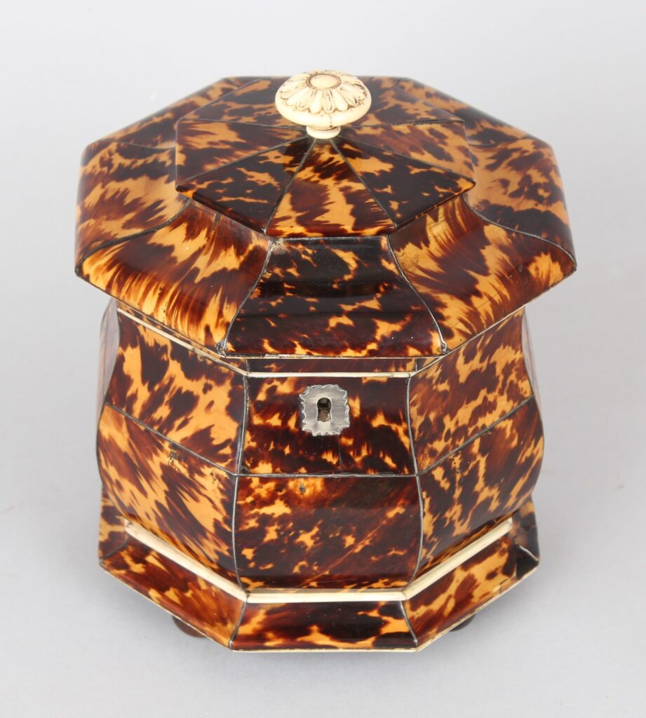A fine Regency period octagonal tortoiseshell tea caddy