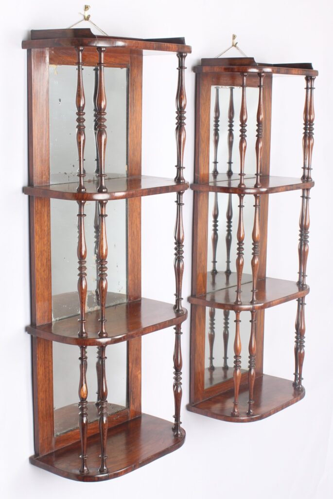 Fine pair of Regency rosewood display shelves
