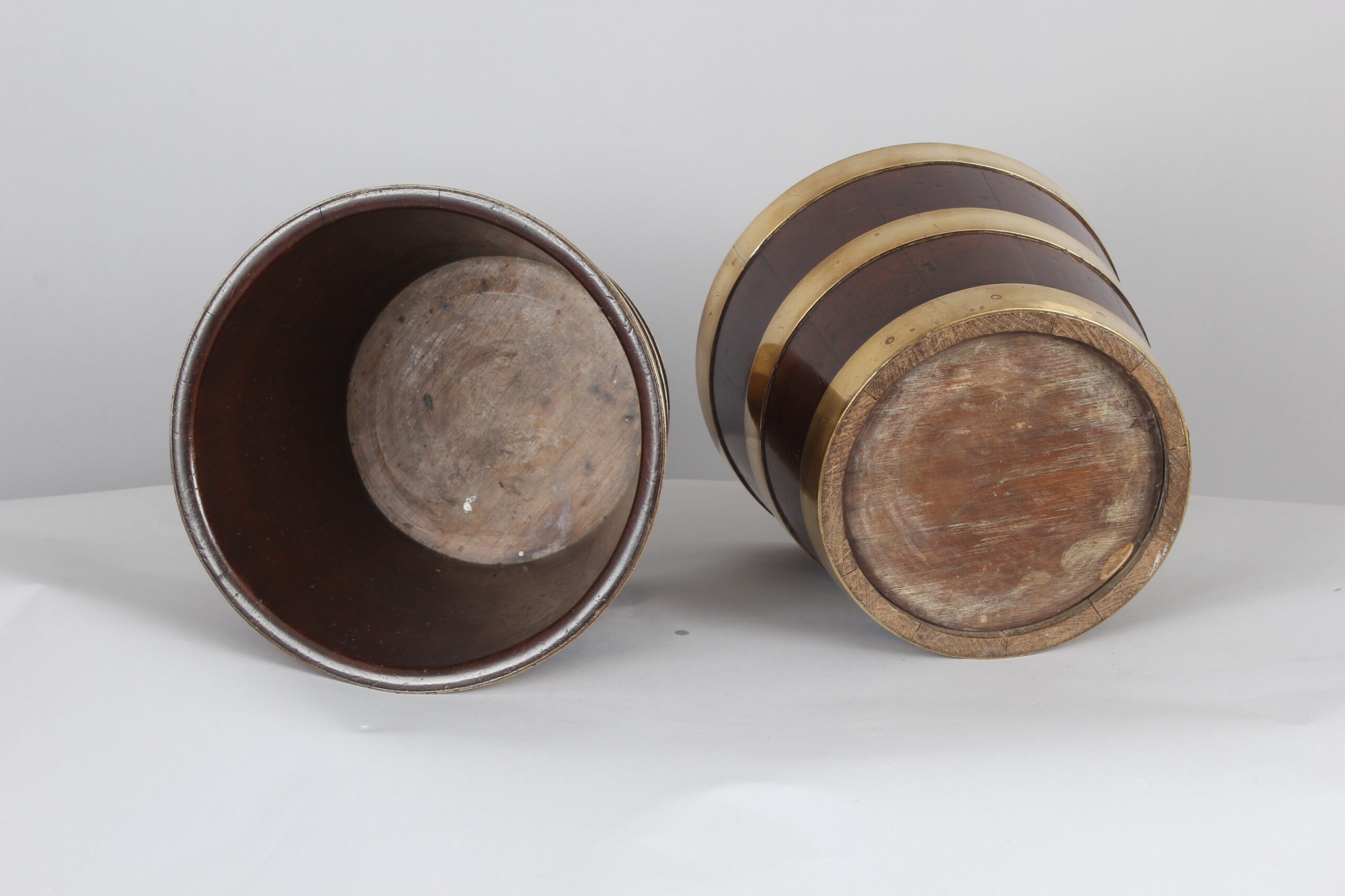 Pair of George III period mahogany and brass banded tubs