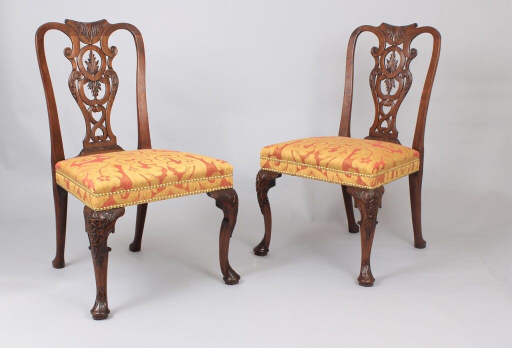 A pair of fine George II period walnut side chairs