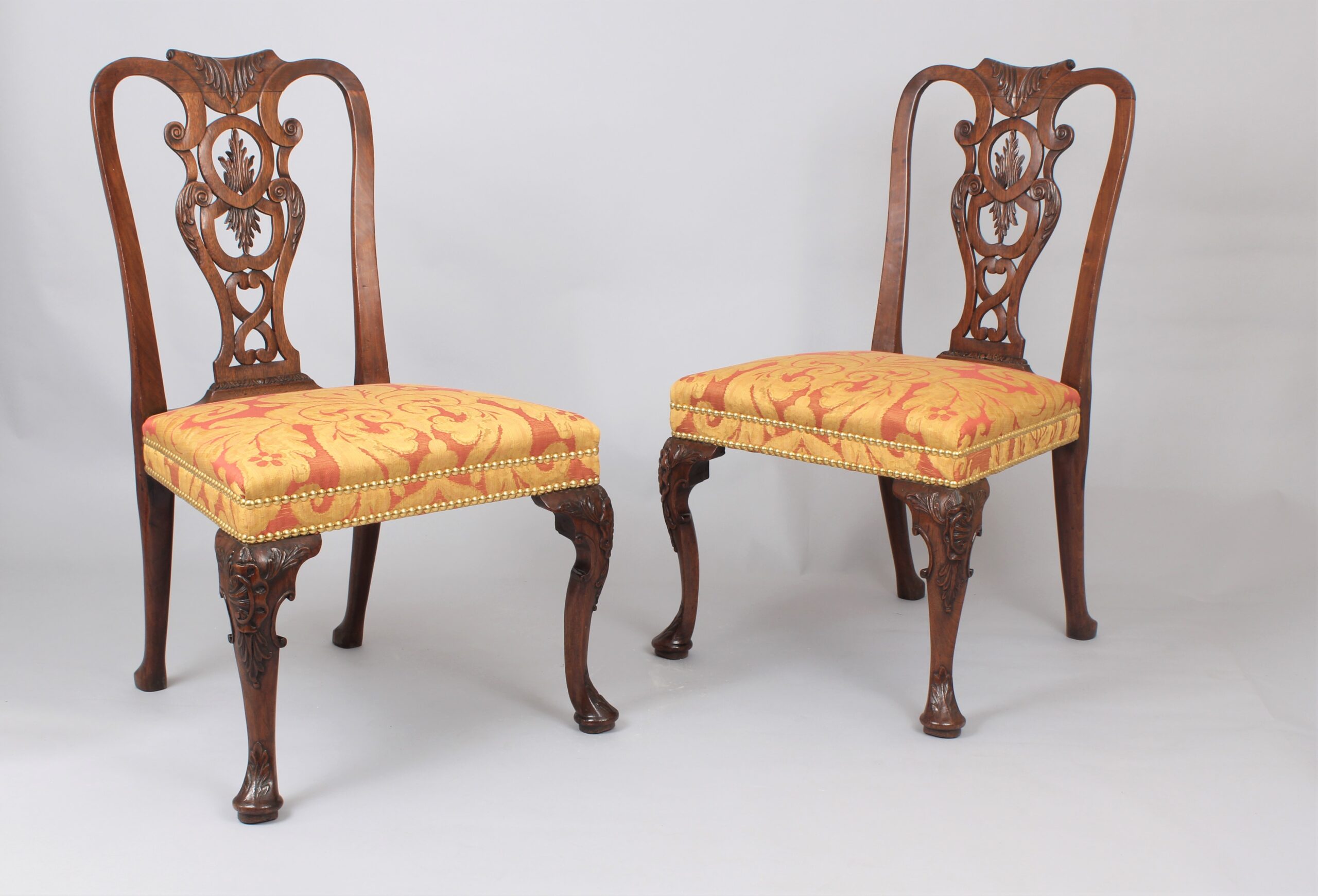 A pair of fine George II period walnut side chairs