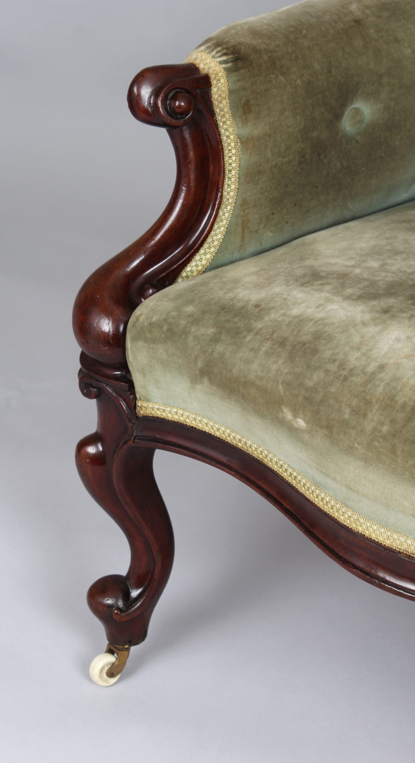 A pair of mid-Victorian easy chairs