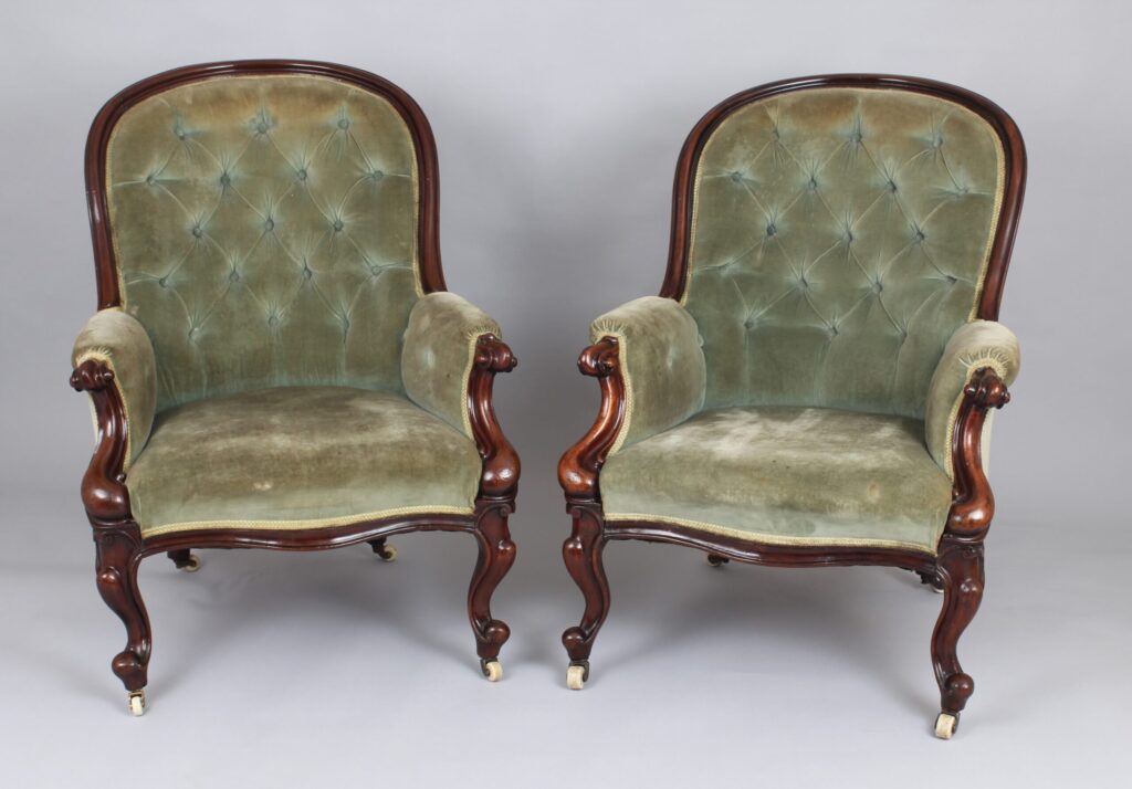 A pair of mid-Victorian easy chairs