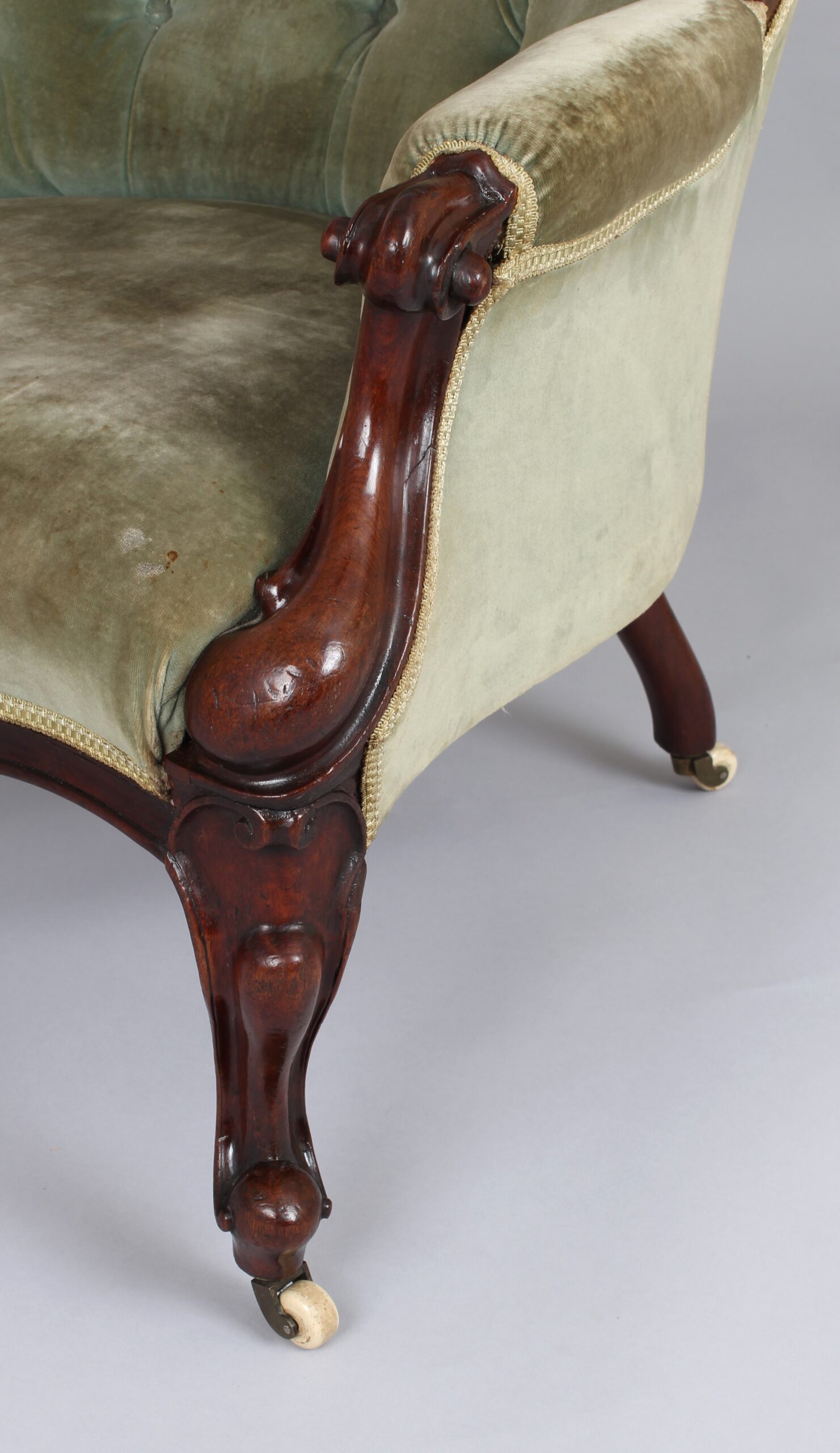 A pair of mid-Victorian easy chairs