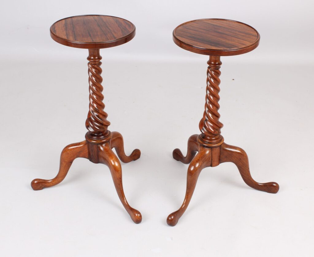 An unusual pair of early 19th century tripod tables
