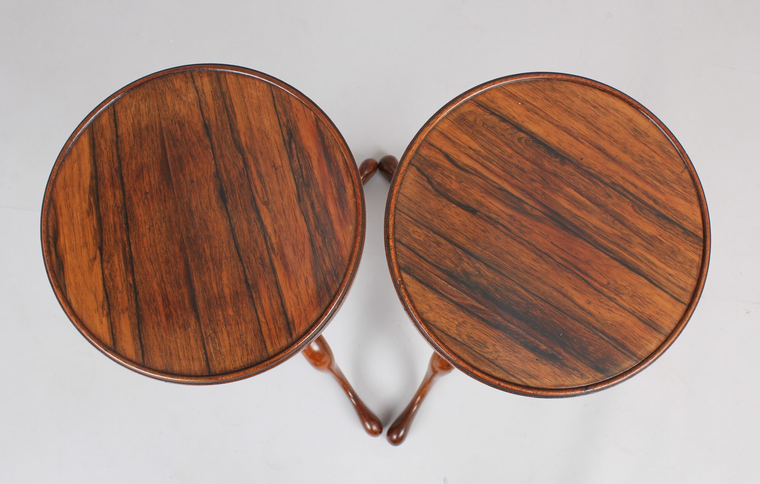 An unusual pair of early 19th century tripod tables