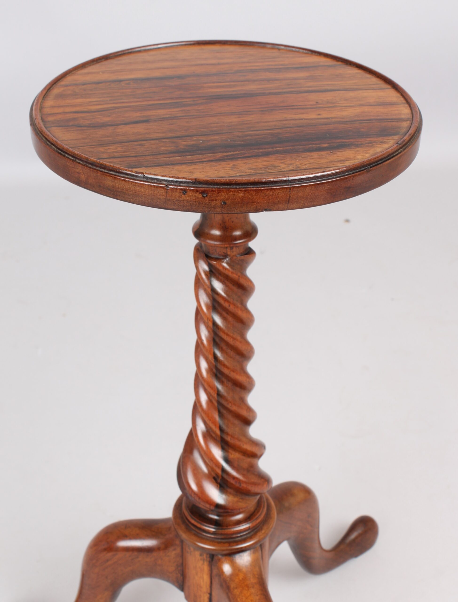 An unusual pair of early 19th century tripod tables