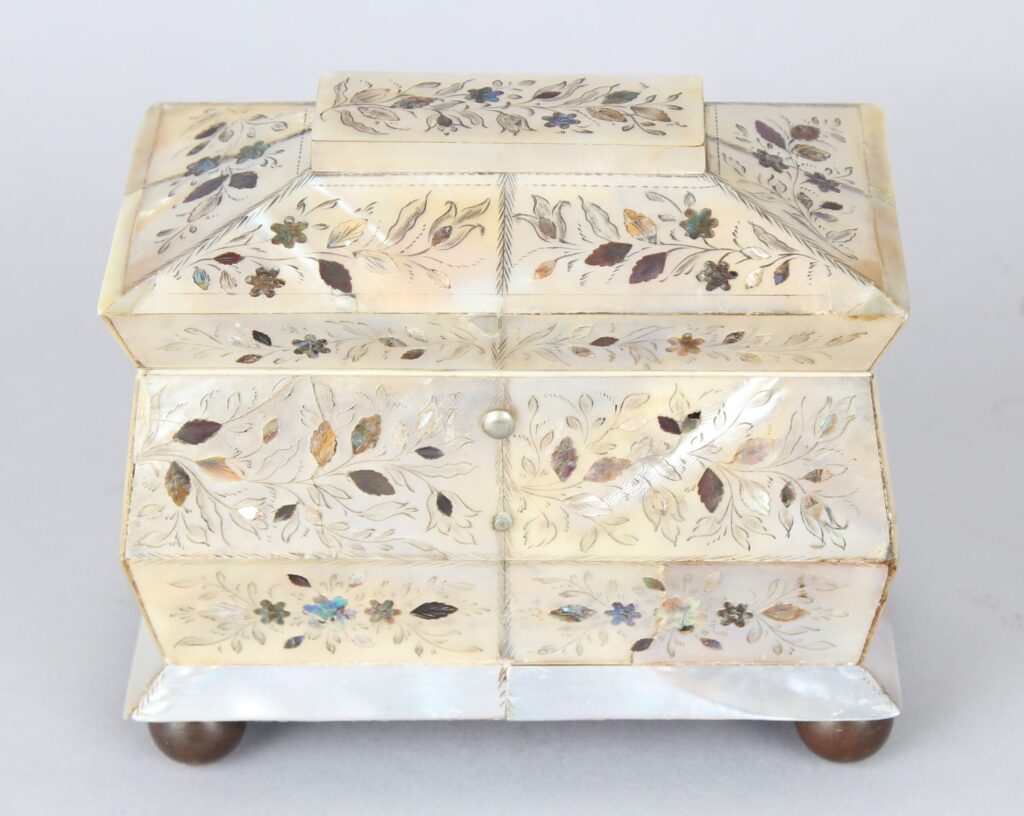 An unusually small early Victorian mother of pearl tea caddy