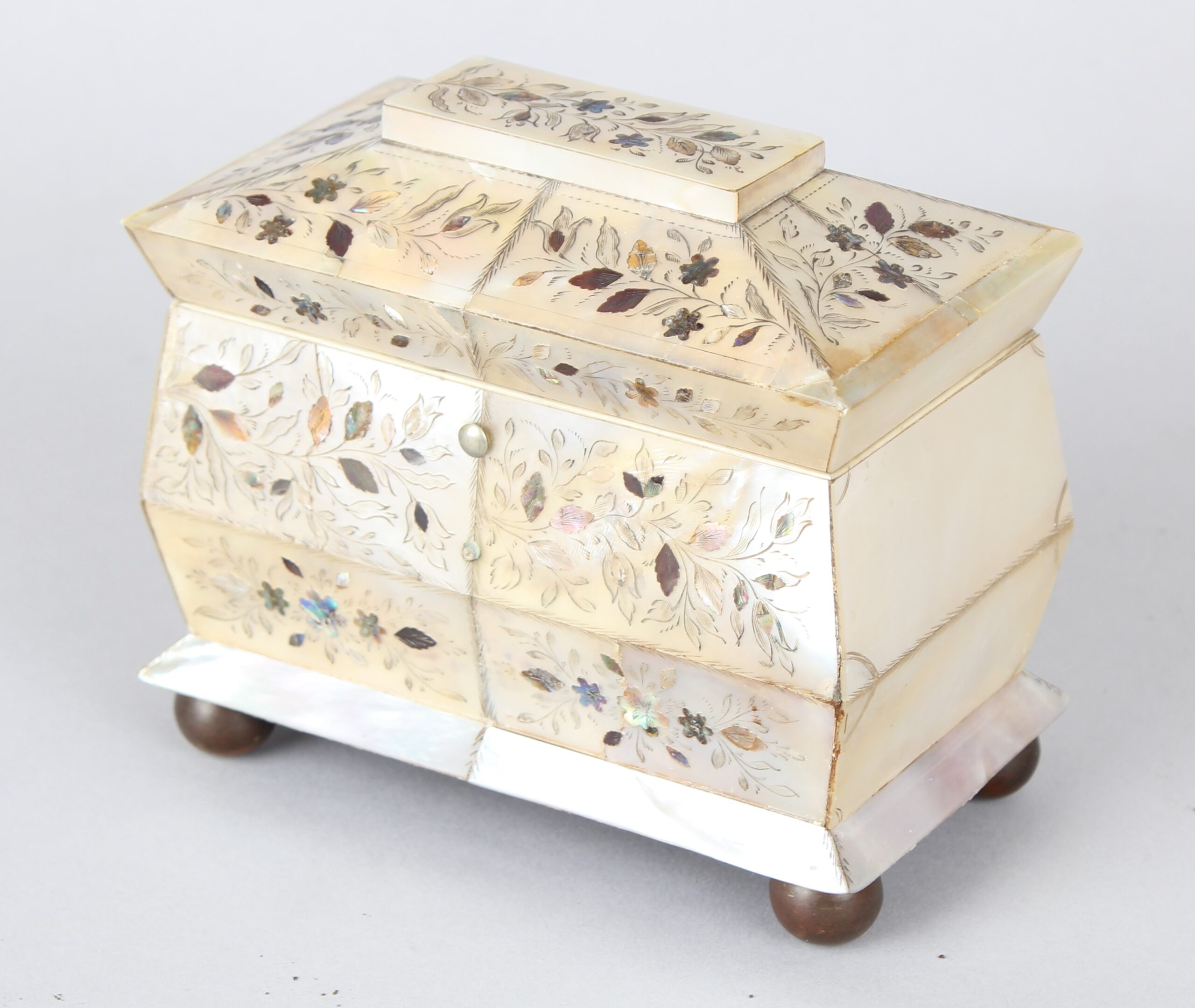 An unusually small early Victorian mother of pearl tea caddy