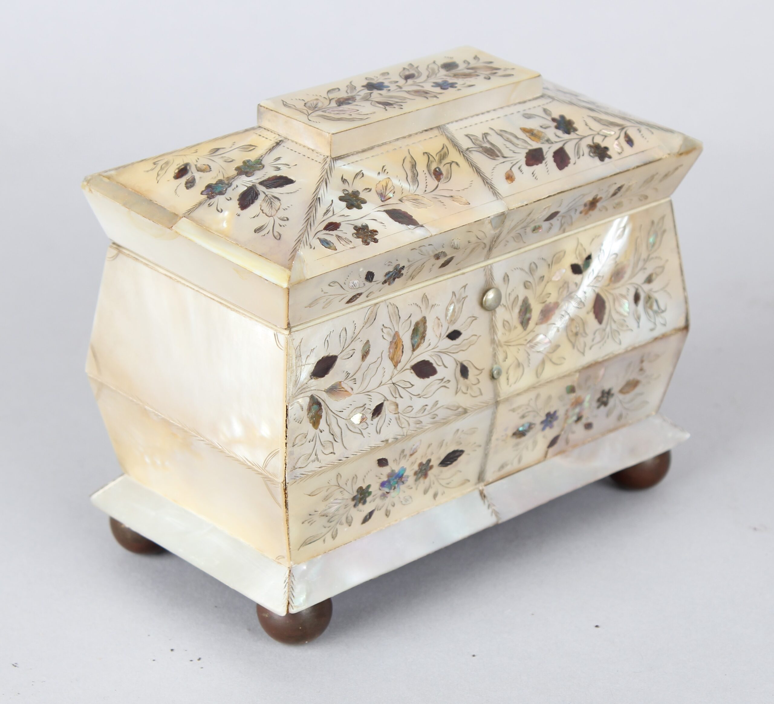 An unusually small early Victorian mother of pearl tea caddy
